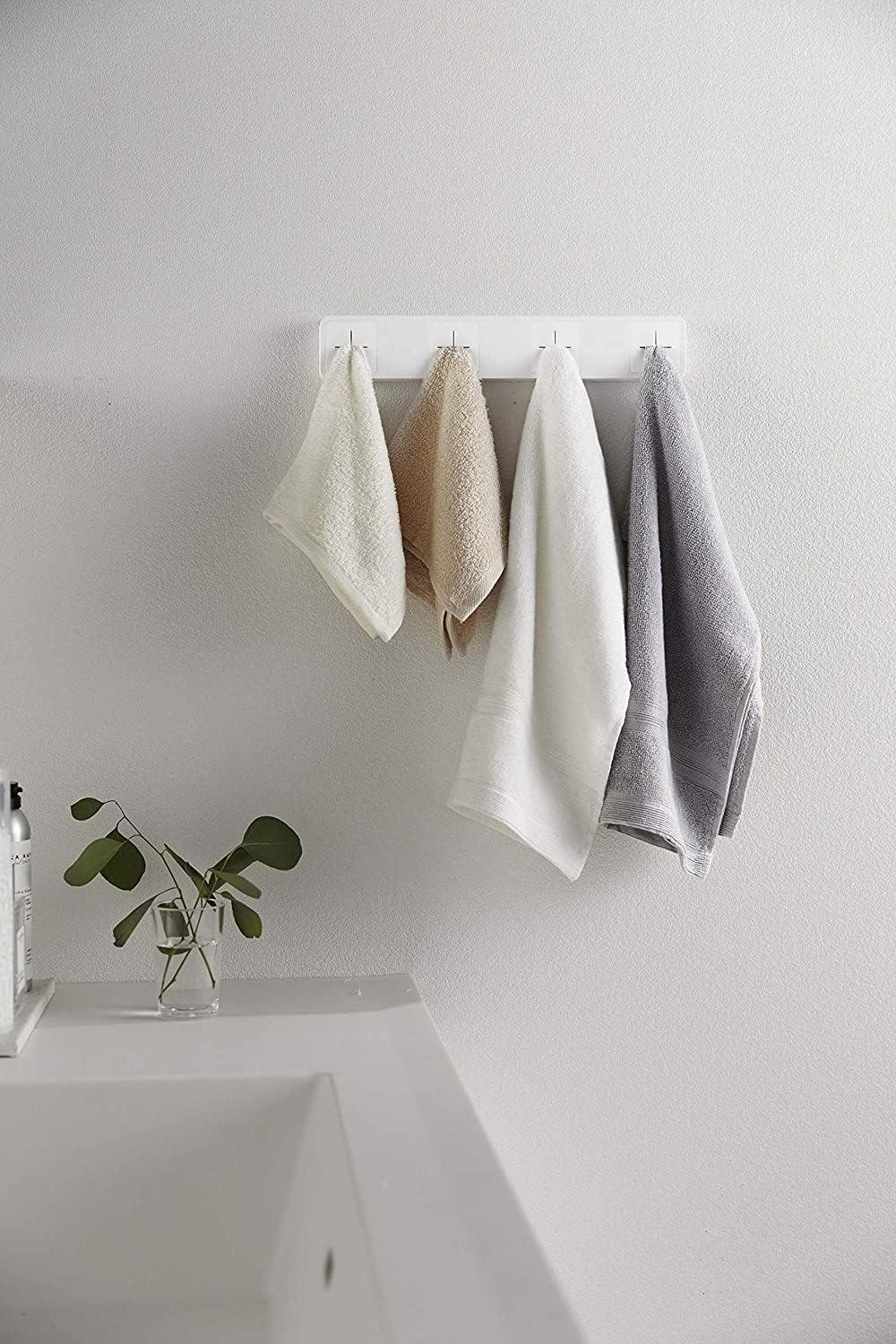 White Wall-Mounted Plastic Towel Holder with Four Slots