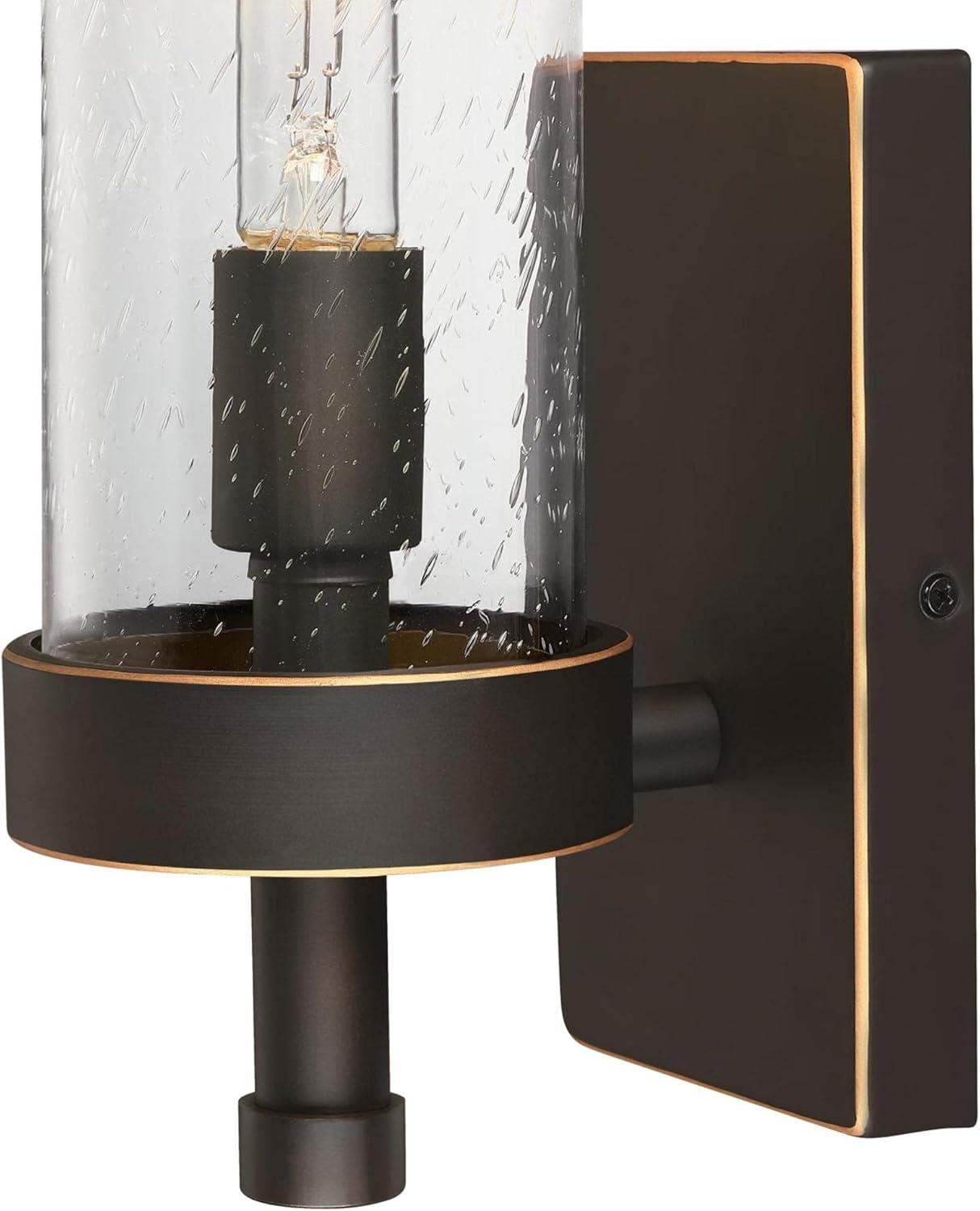 Elegant Lavina Oil-Rubbed Bronze Cylinder Wall Sconce with Seeded Glass