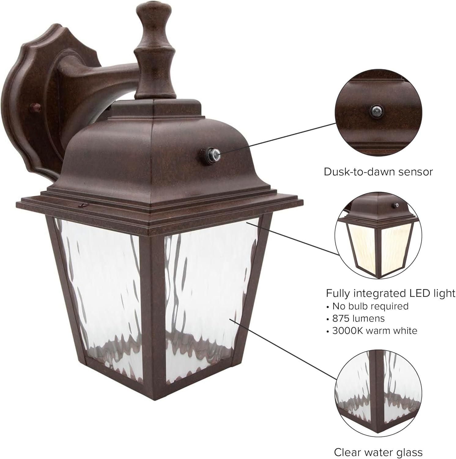 Maxxima LED Porch Lantern Outdoor Wall Light Fixture - Aged Bronze, Clear Water Glass, Photocell Sensor, 875 Lumens, 3000K Warm White, Dusk to Dawn Light Sensor, Exterior Decorative Light