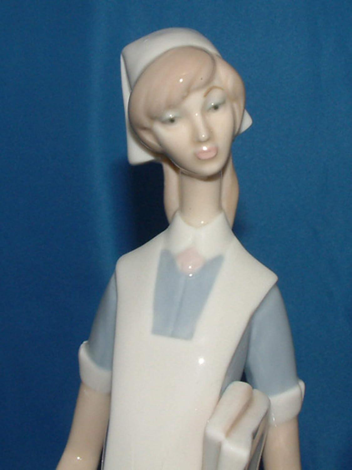 Matte White Porcelain Nurse Figurine with Delicate Petal Details