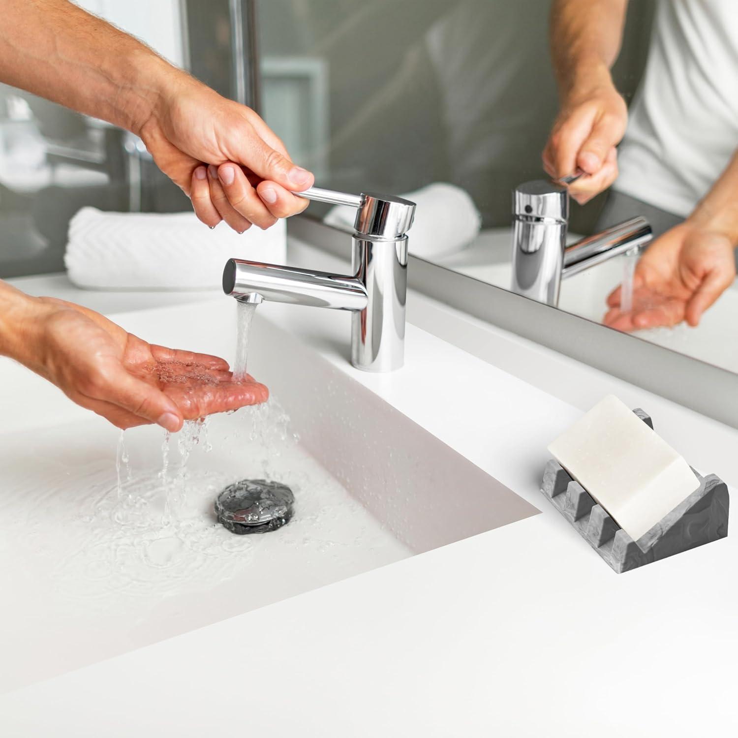 iSoapStone Premium Self-Draining Silicone Soap Dish: Waterfall Bar Holder Tray with Drain Saver, Anti-Slip Kitchen & Bathroom Accessory for Sponges and Bar Soaps - Patent-Pending Design (Light Grey)