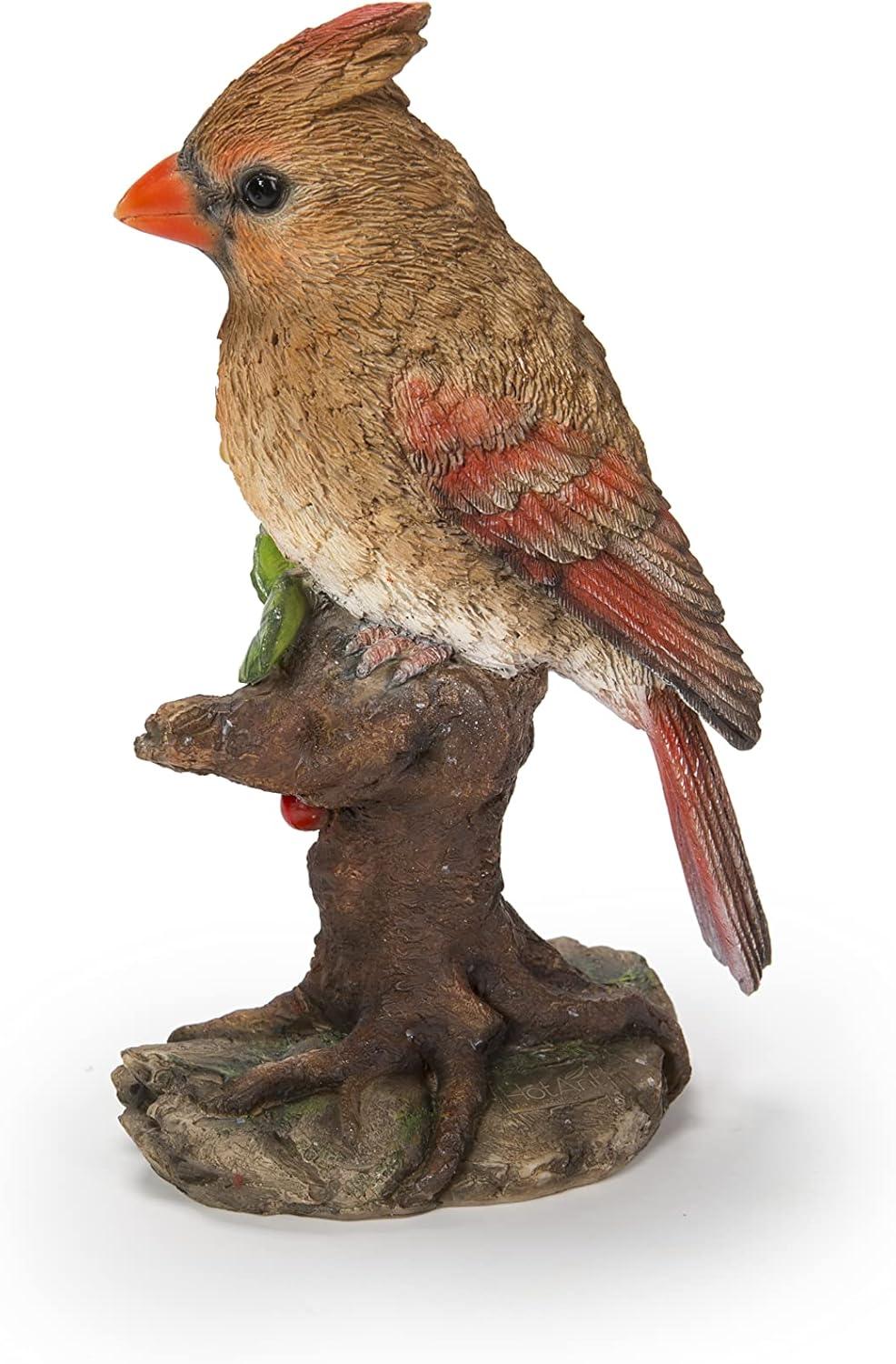 Female Cardinal Perched On A Stump Statue