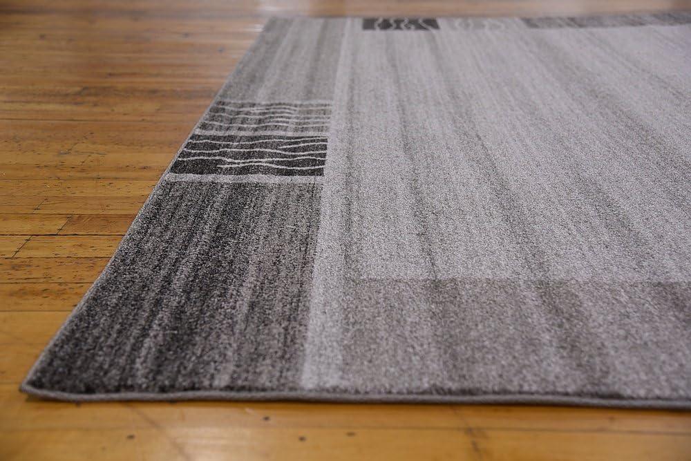 Angelica Light Gray 9' x 12' Tufted Geometric Synthetic Area Rug