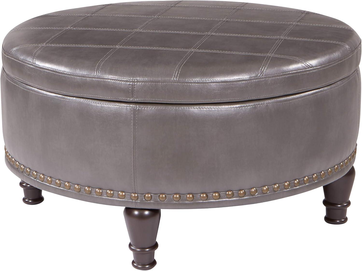 OSP Home Furnishings Augusta Round Storage Ottoman in Pewter Bonded Leather with decorative nailheads