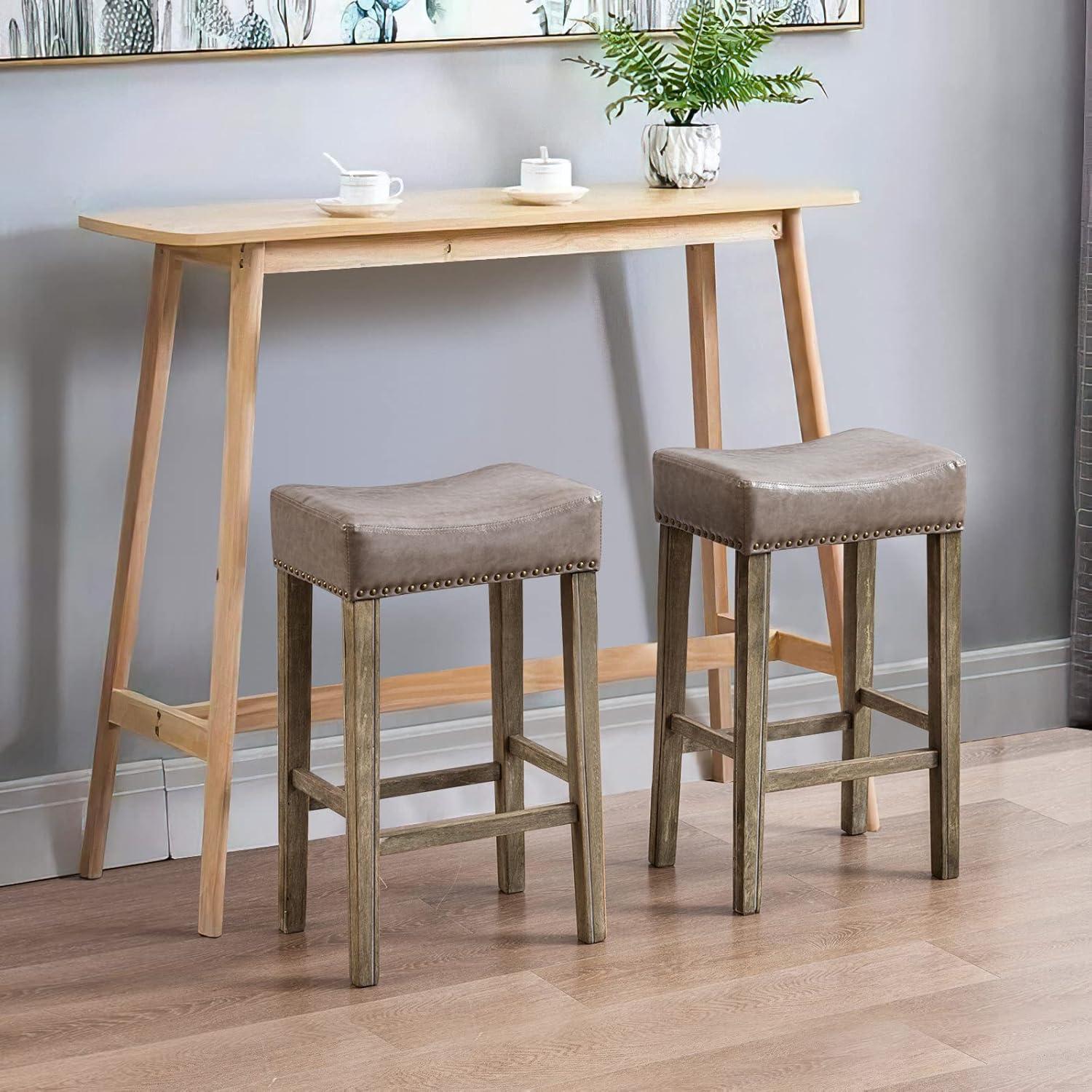 Bar Stools Set of 2, 26" Faux PU Leather Upholstered Counter Height Backless Saddle Stools with Nailhead Trims and Solid Wood Legs Farmhouse Island Chairs for Kitchen Dining Room Pub, Gray