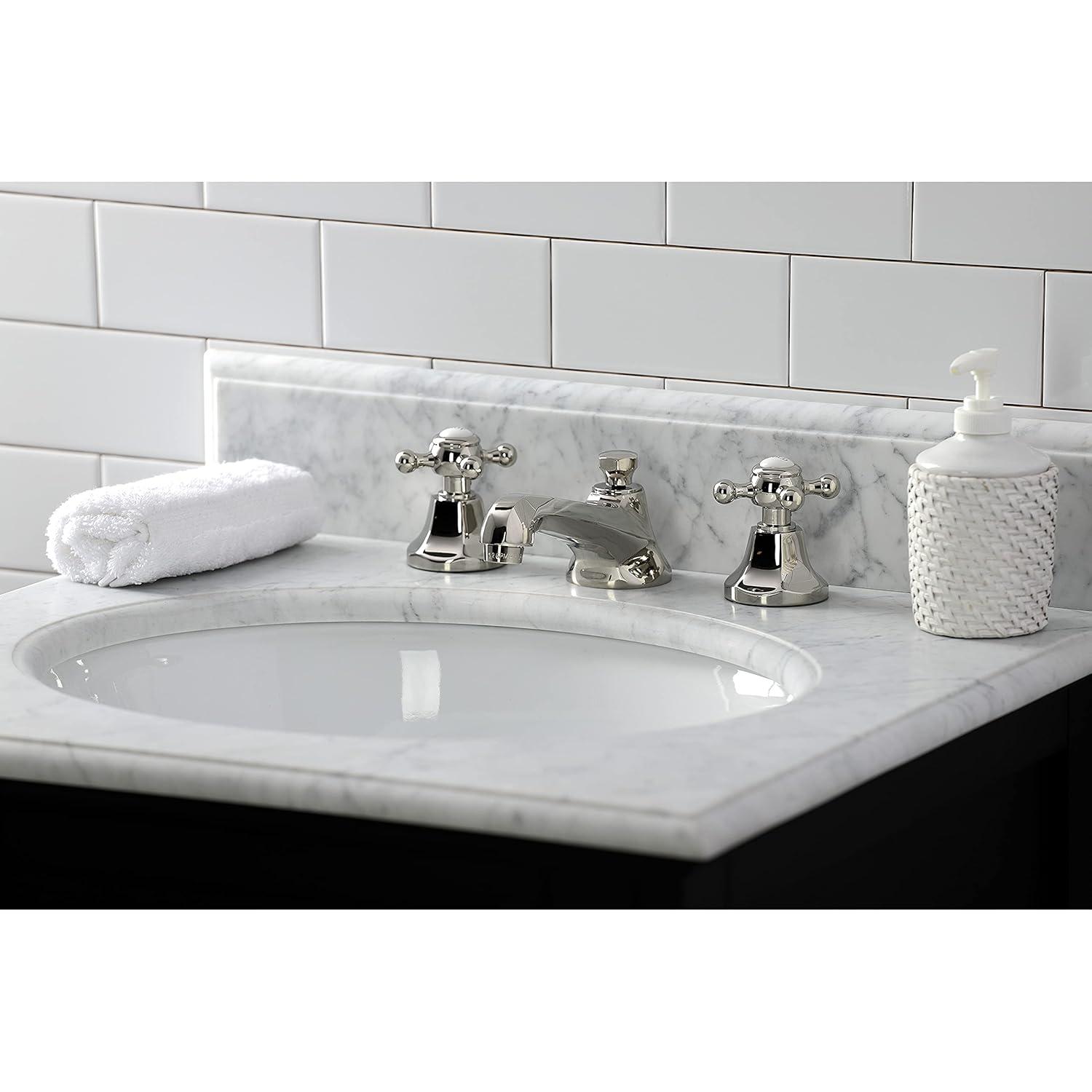 Kingston Brass Metropolitan Two-Handle 3-Hole Deck Mount Widespread Bathroom Faucet with Brass Pop-Up Drain