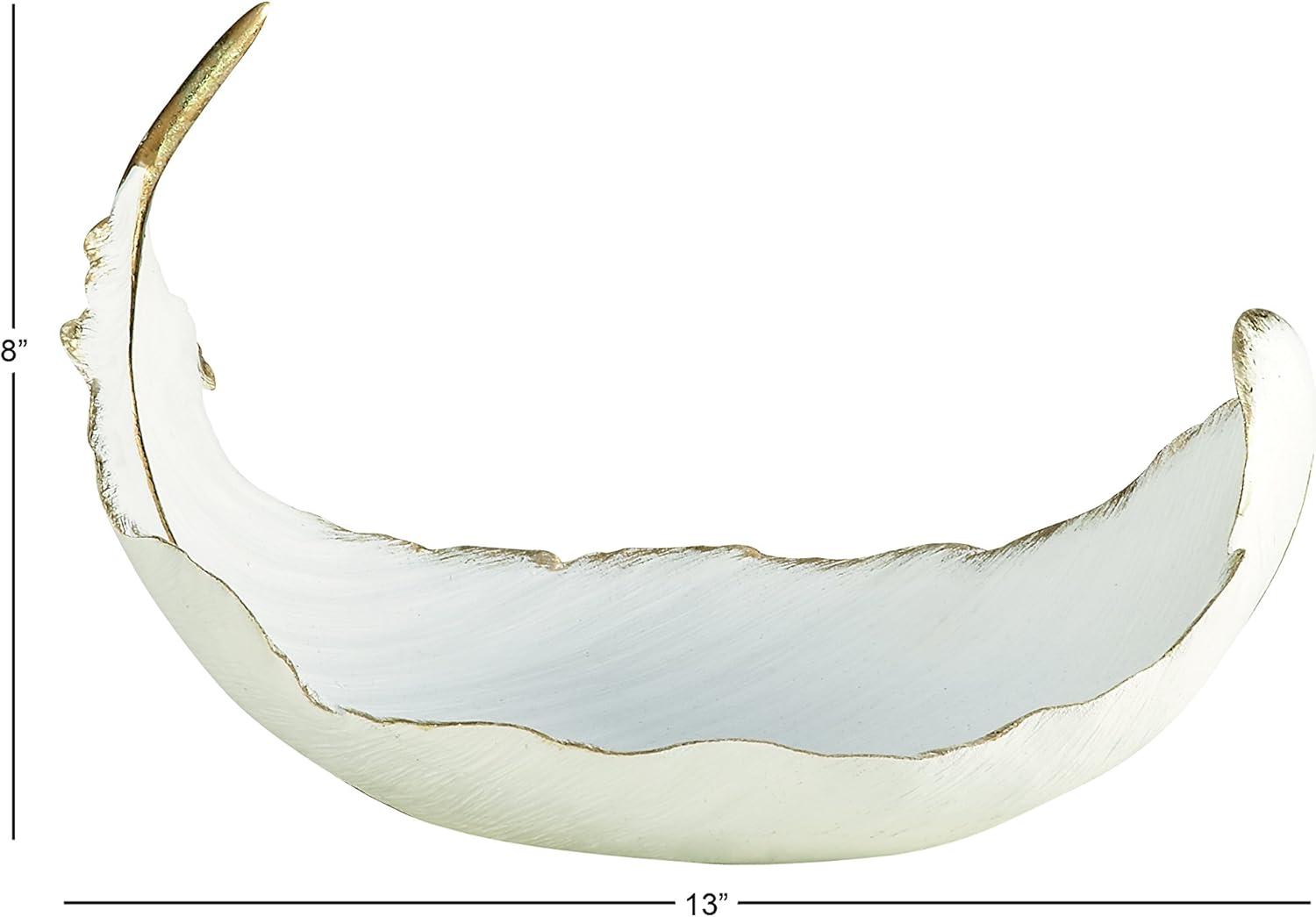 CosmoLiving by Cosmopolitan 8" Oval Curved Feather Bird Polystone Decorative Bowl with Gold Accents