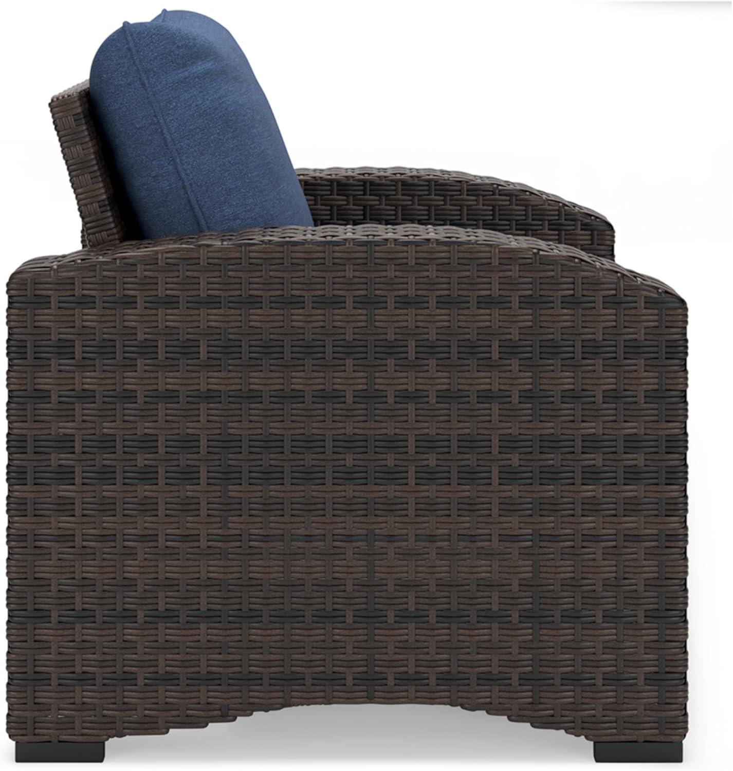 Signature Design by Ashley Windglow Outdoor Wicker Lounge Chair with Cushion, Blue/Brown