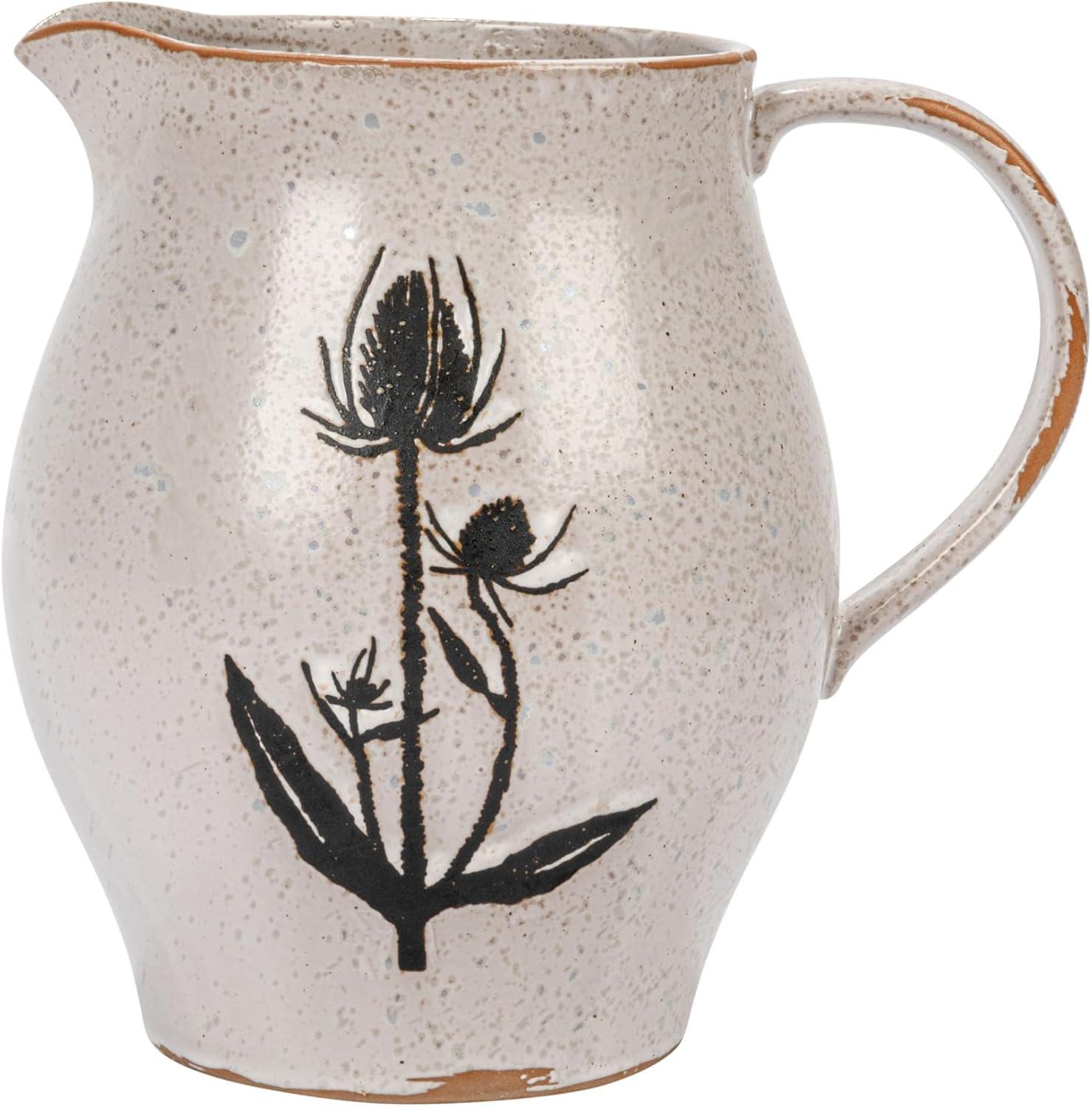 Creative Co-Op 6.75 Inches 50-ounce Debossed Stoneware Pitcher with Flower Design, Reactive Glaze, White and Black