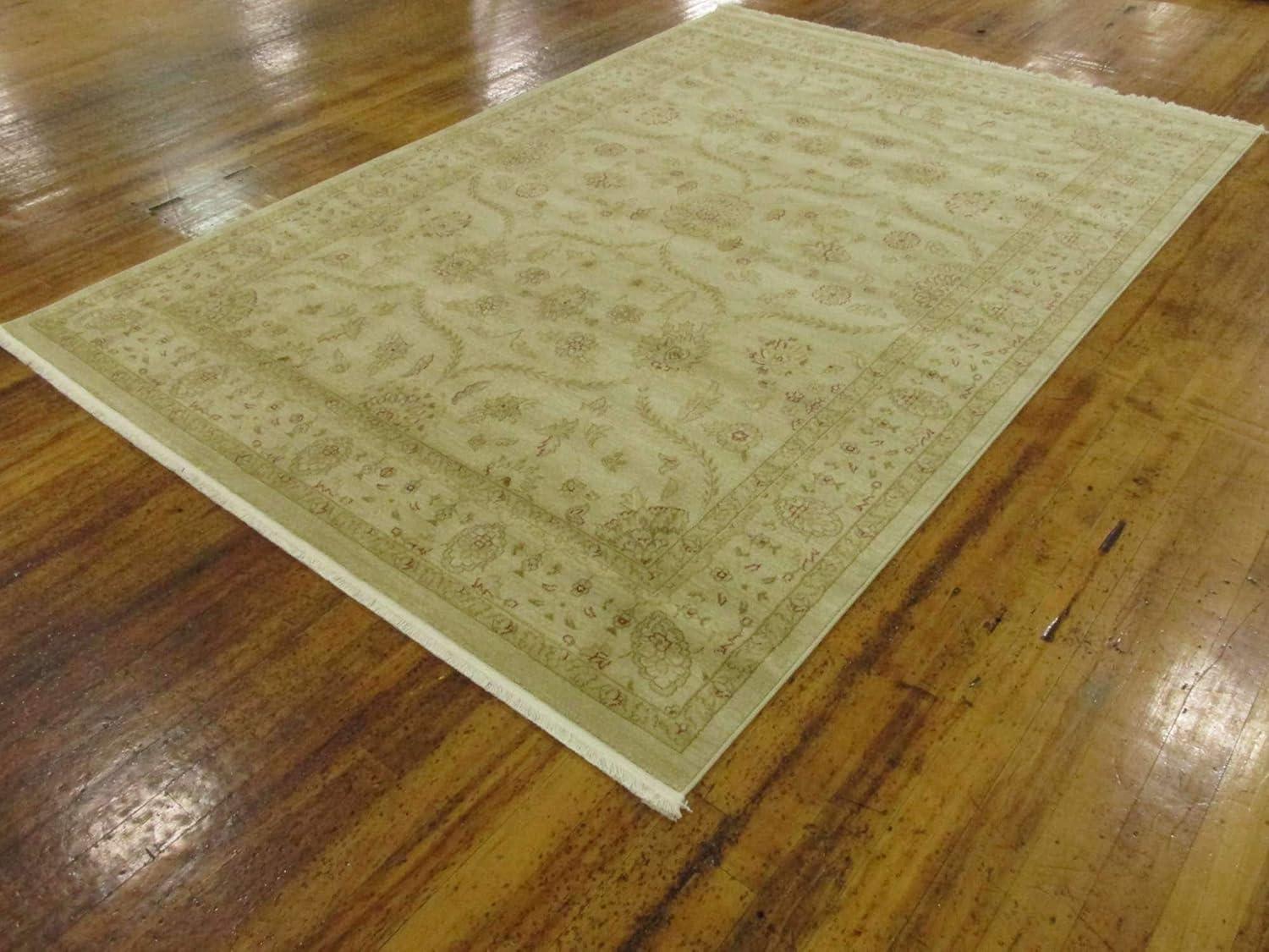 Cream and Beige 9' x 12' Synthetic Traditional Area Rug