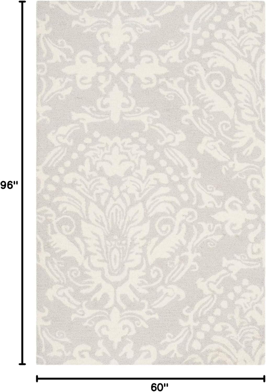 Handmade Floral Bliss Blue/Ivory Wool 5' x 8' Tufted Area Rug