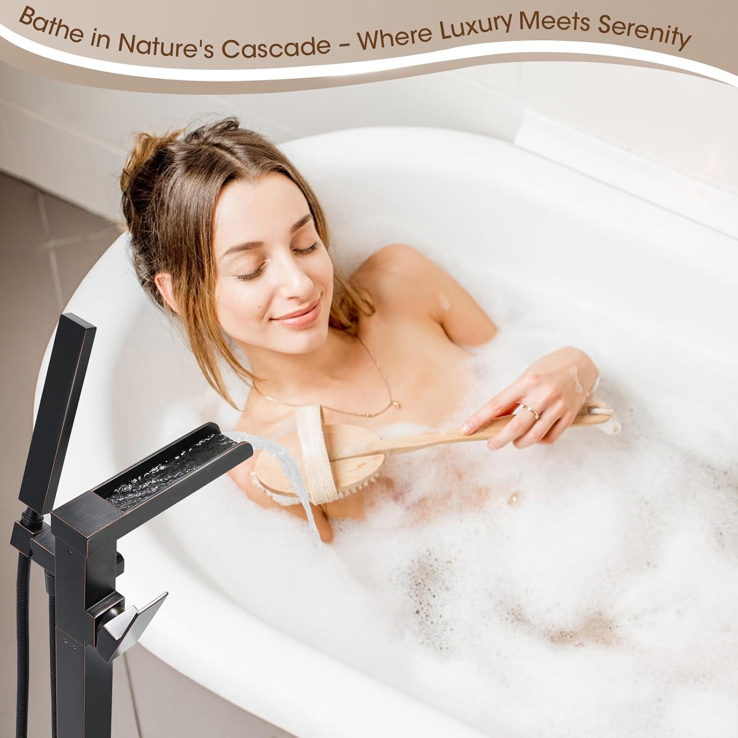 Single-Handle Floor Mount Freestanding Tub Faucet Waterfall Tub Filler with Handheld Shower in Oil Rubbed Bronze