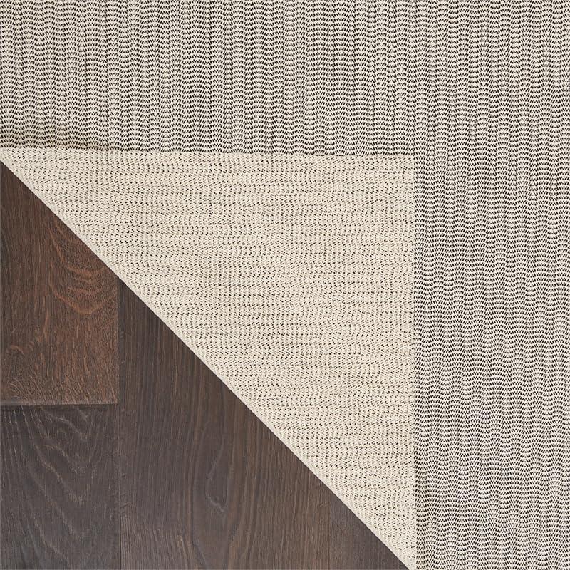 Ebern Designs Rectangle Shiftloc Solid Color Machine Made Polyester/Plastic/Acrylic Area Rug in Ivory