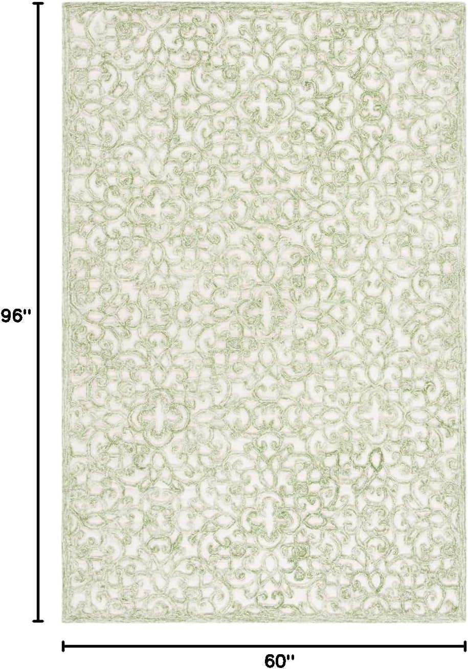Trace TRC103 Hand Tufted Area Rug - Ivory/Green - 5'x8' - Safavieh.