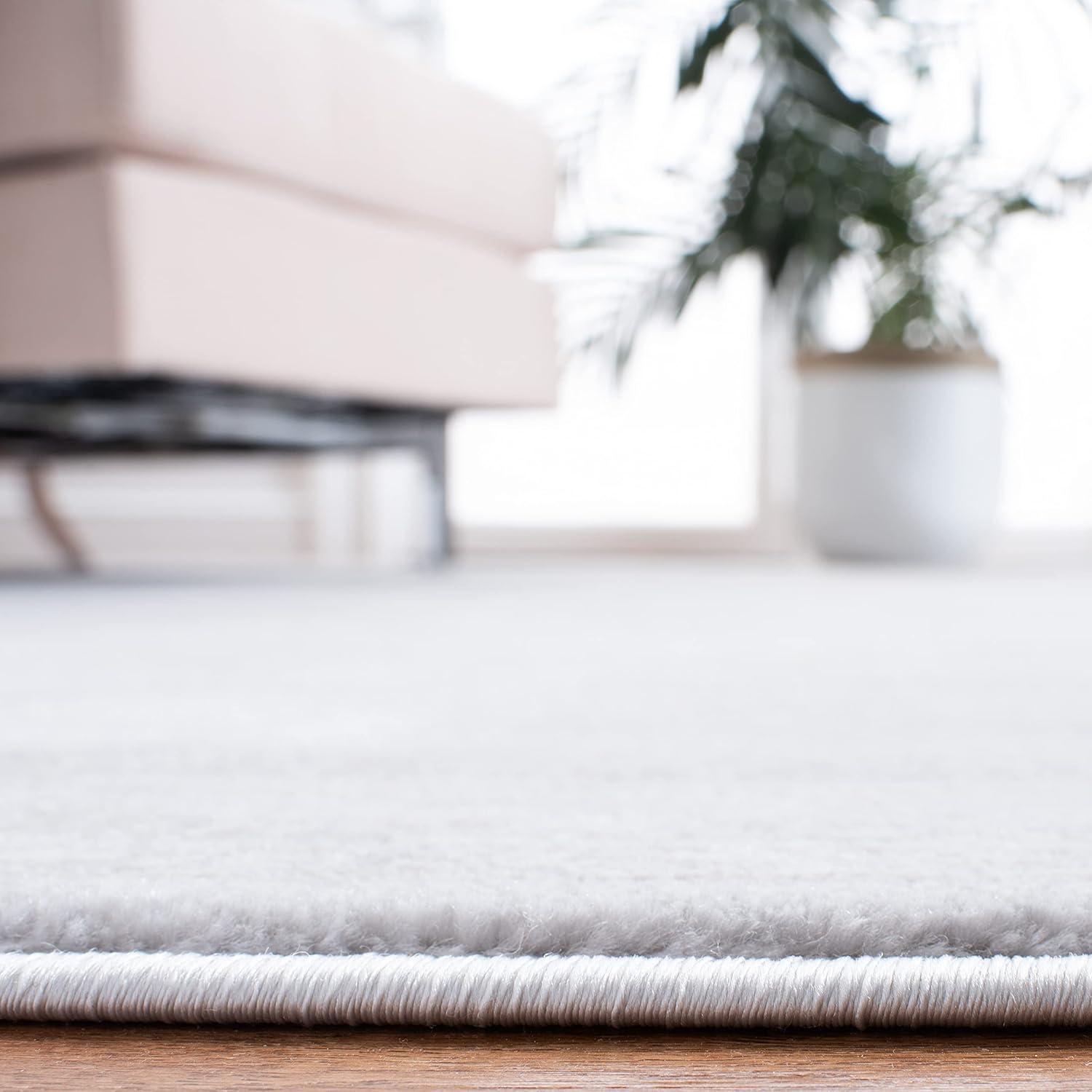 Carnegie CNG691 Power Loomed Area Rug - Light Grey/Grey - 6'7"x9'2" - Safavieh.