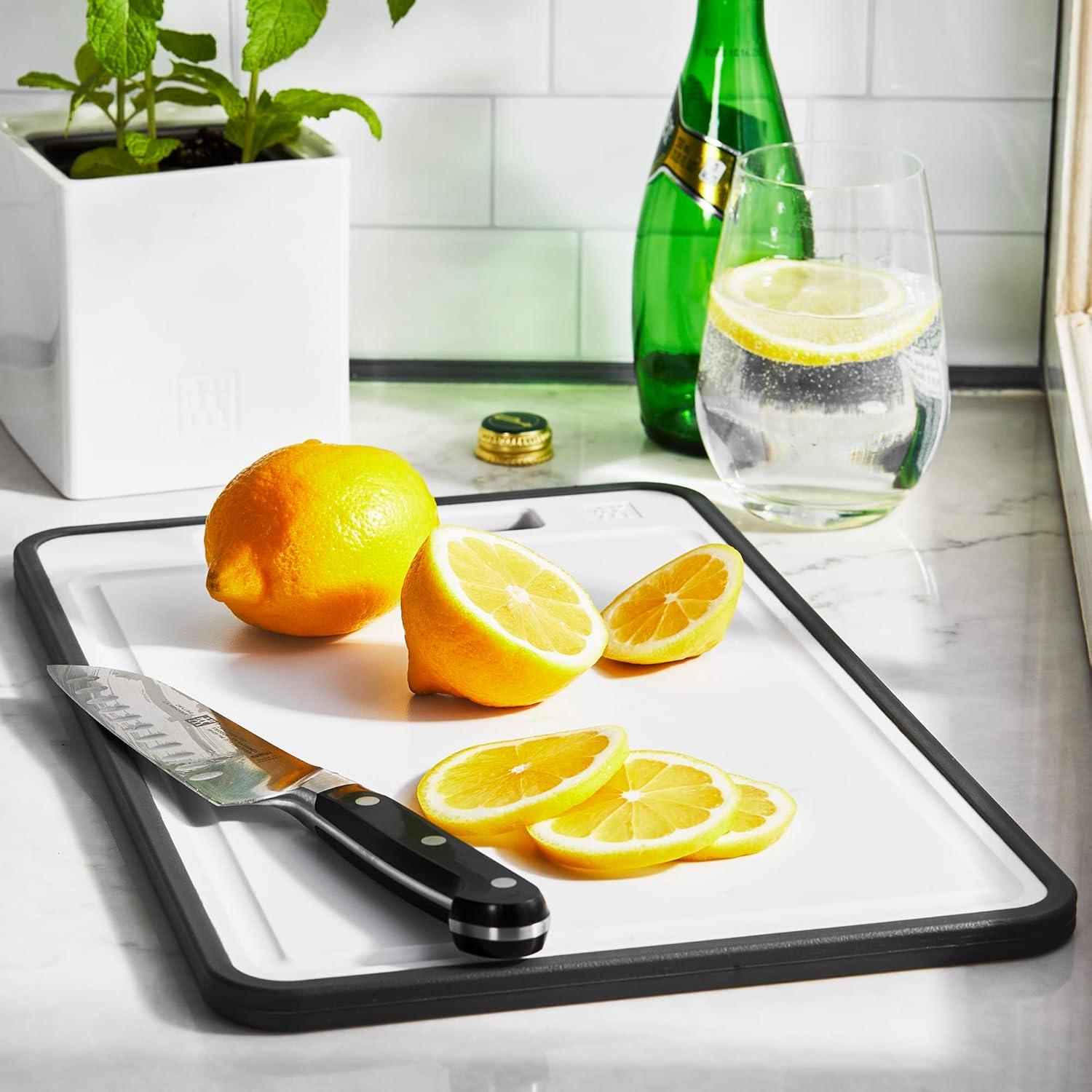 White and Black Rectangular Plastic Cutting Board with Handle