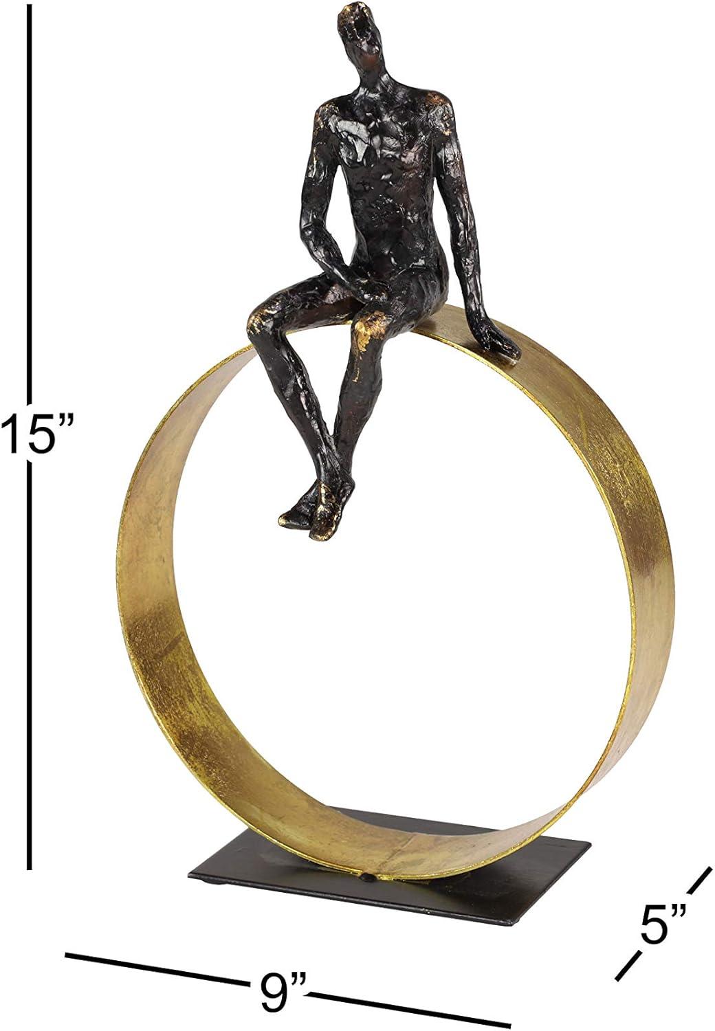 Black and Gold Resin Human Figurine on Circular Base