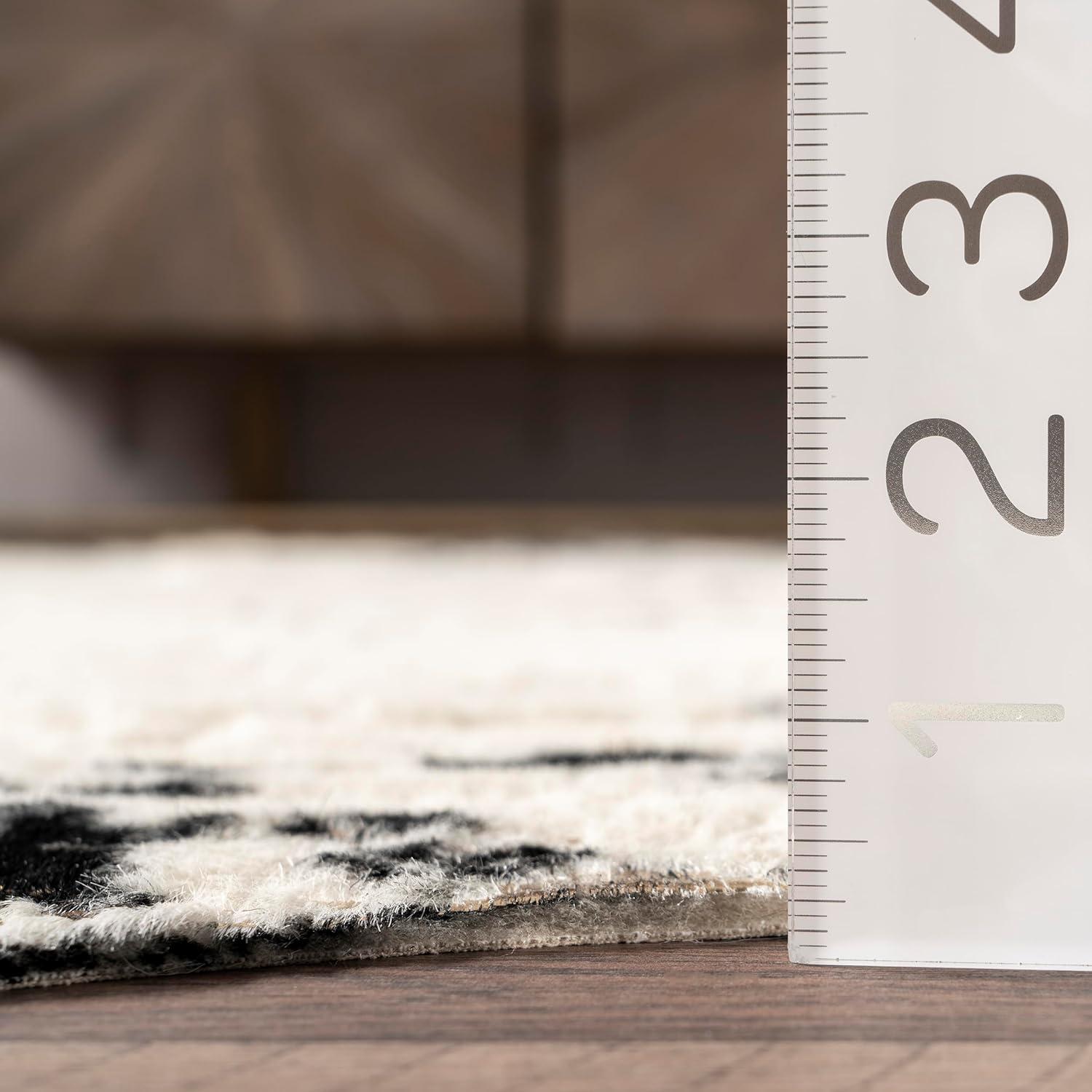 Chehalis Contemporary Faux Cowhide Power Loom Black/Gold Rug