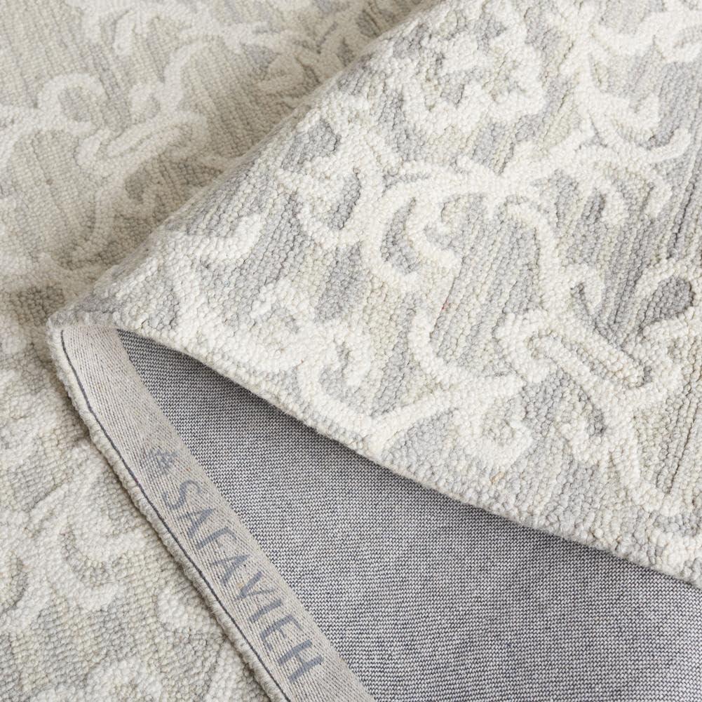 SAFAVIEH Blossom Cletus Geometric Wool Area Rug, Green/Ivory, 10' x 14'