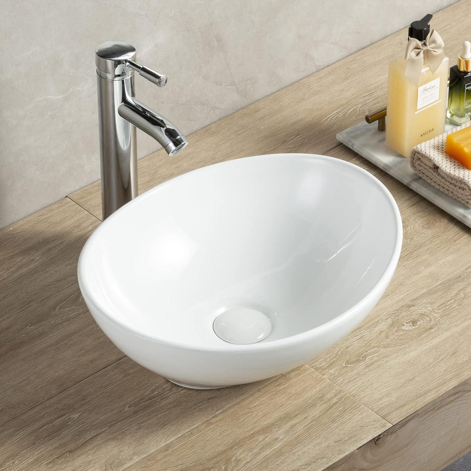 Bathivy Oval Vessel Sink, 14.6'' x 11.6'' Modern Above Counter Oval Bathroom Sink, Small White Porcelain Bathroom Vessel Sink with Pop Up Drain