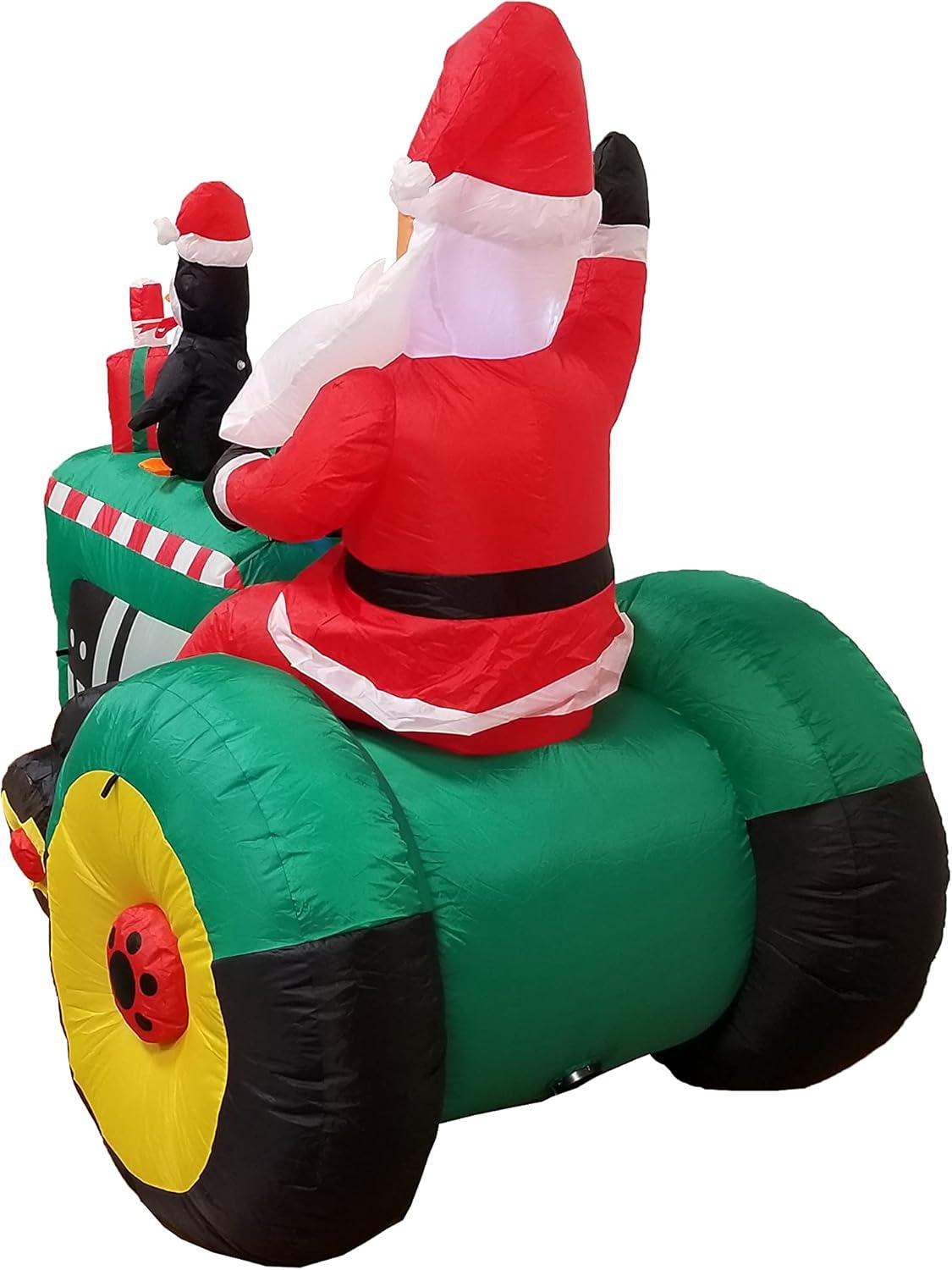 5.3 Foot Inflatable Santa Claus on Tractor with Penguin and LED Lights