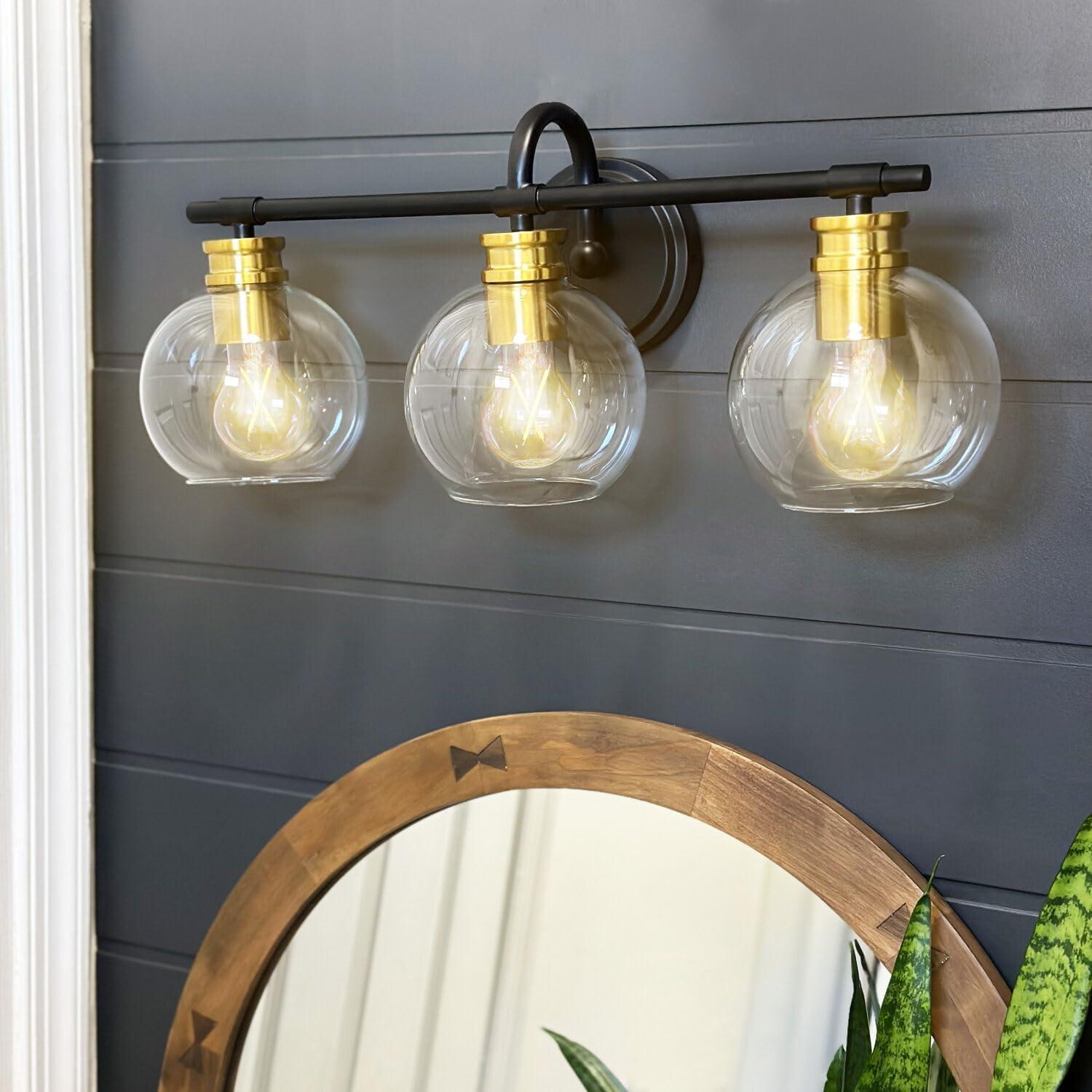 Black and Brushed Brass 3-Light Vanity Bar with Clear Glass Shades