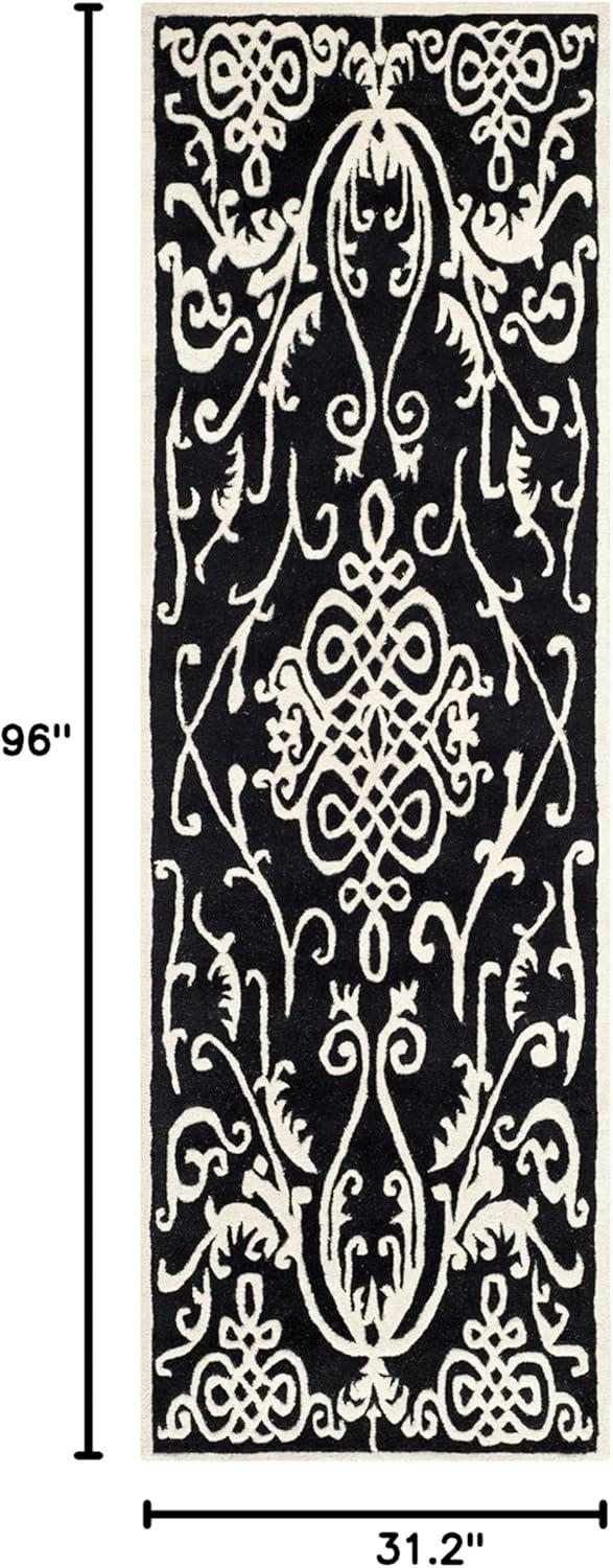 Soho SOH120 Hand Tufted Area Rug - Black/Ivory - 5'x8' - Safavieh.