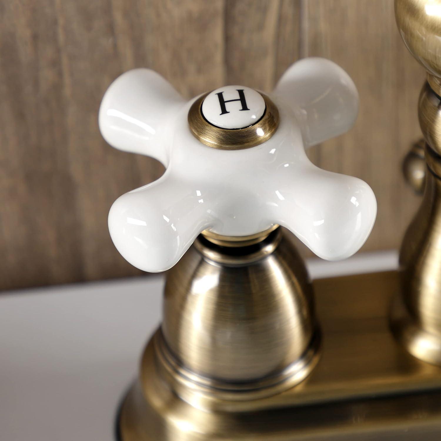 Kingston Brass Heritage Two-Handle 3-Hole Deck Mount 4" Centerset Bathroom Faucet with Plastic Pop-Up