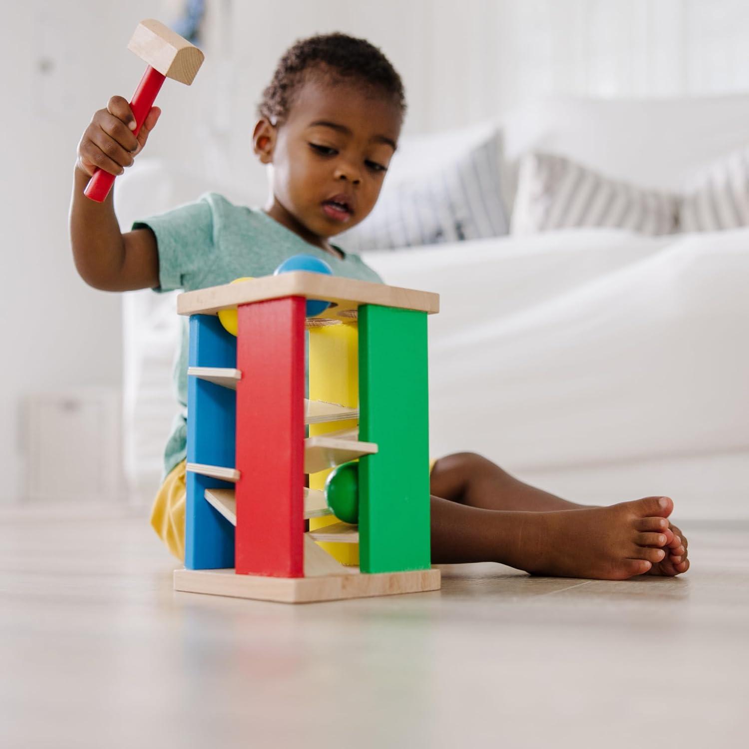 Melissa & Doug Deluxe Pound and Roll Wooden Tower Toy With Hammer