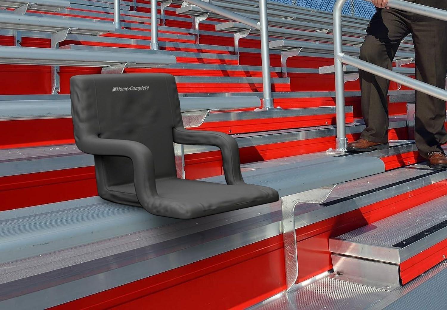 Black Cushioned Wide Stadium Seat with Armrests and Back Support