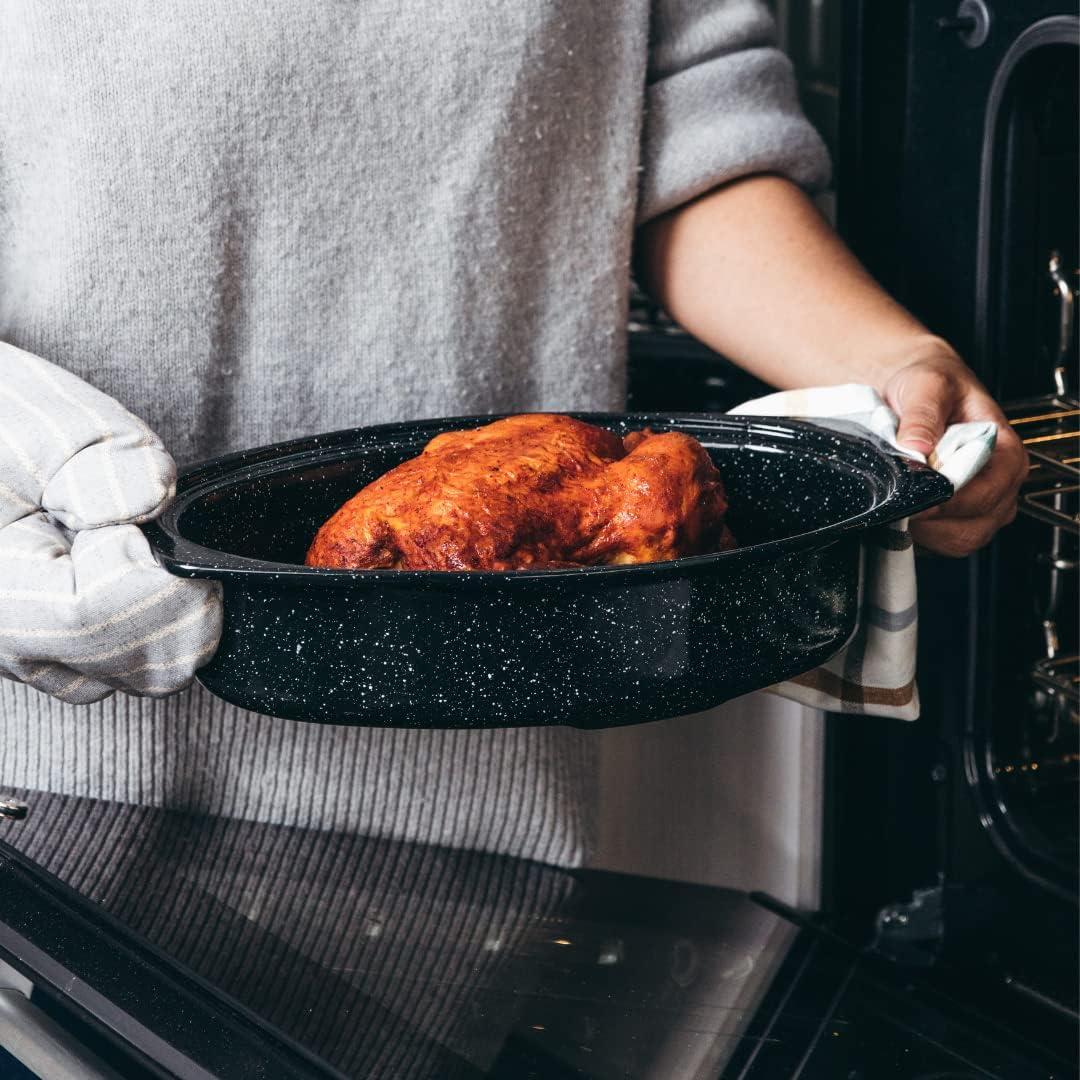 Granite Ware 13-inch oval roaster with Lid. Enameled steel design to accommodate up to 7 lb poultry/roast. Resists up to 932°F. Ideal for preparing meals for two!