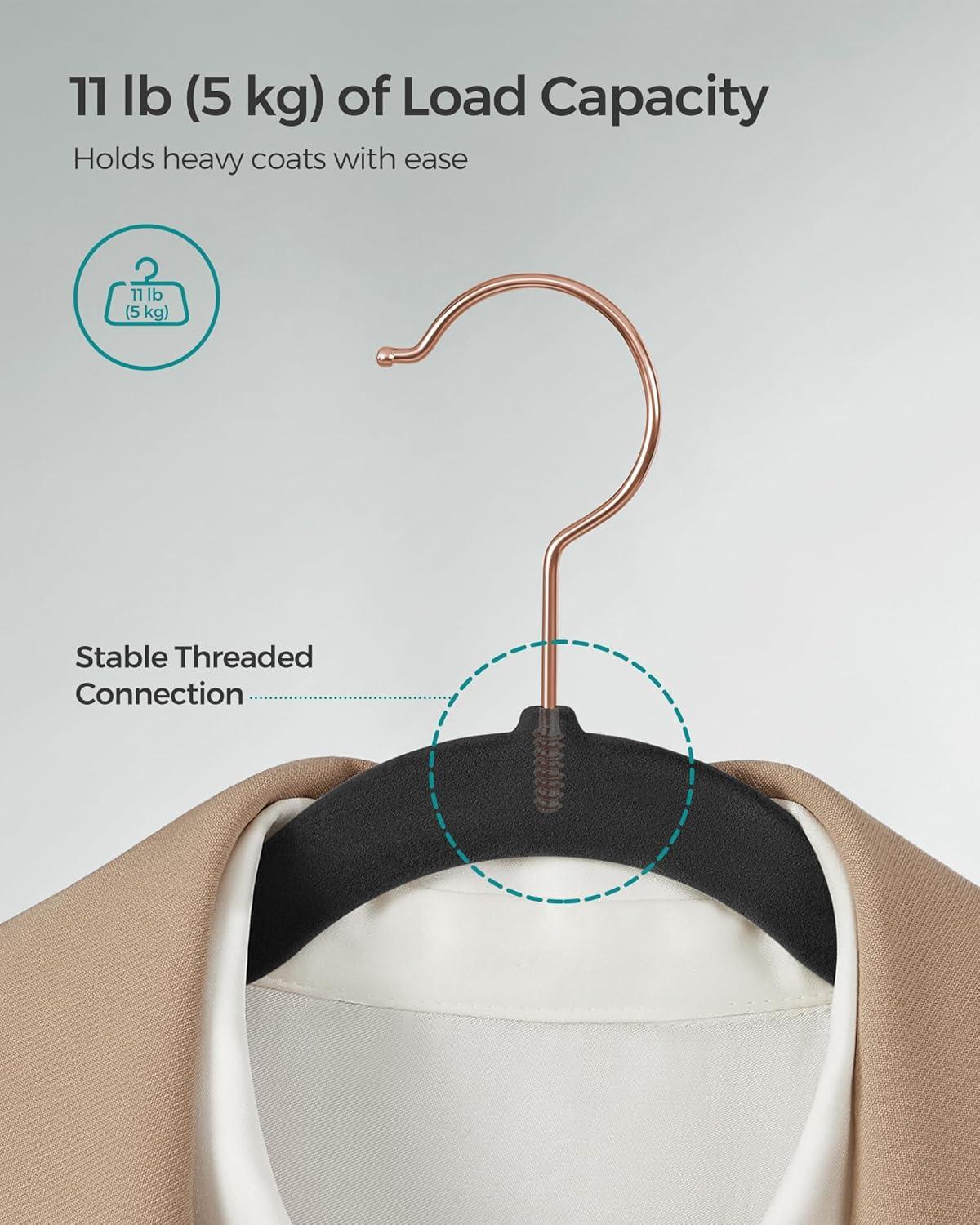 SONGMICS Velvet Hangers 50 Pack, Non-Slip with Rose Gold-Colored Swivel Hooks, Slim Space-Saving for Closet, Heavy-Duty, Black UCRF026B50