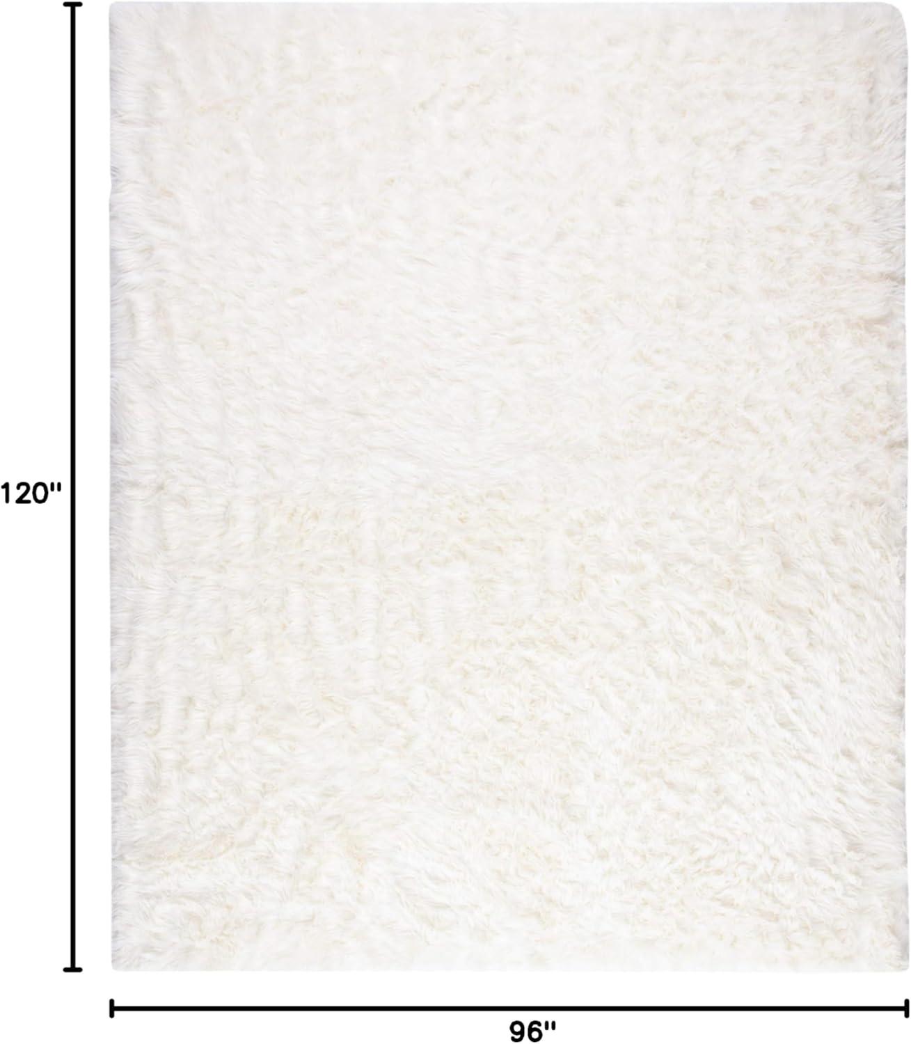 SAFAVIEH Faux Sheep Skin Vesna Solid Plush Area Rug, Ivory, 8' x 10'