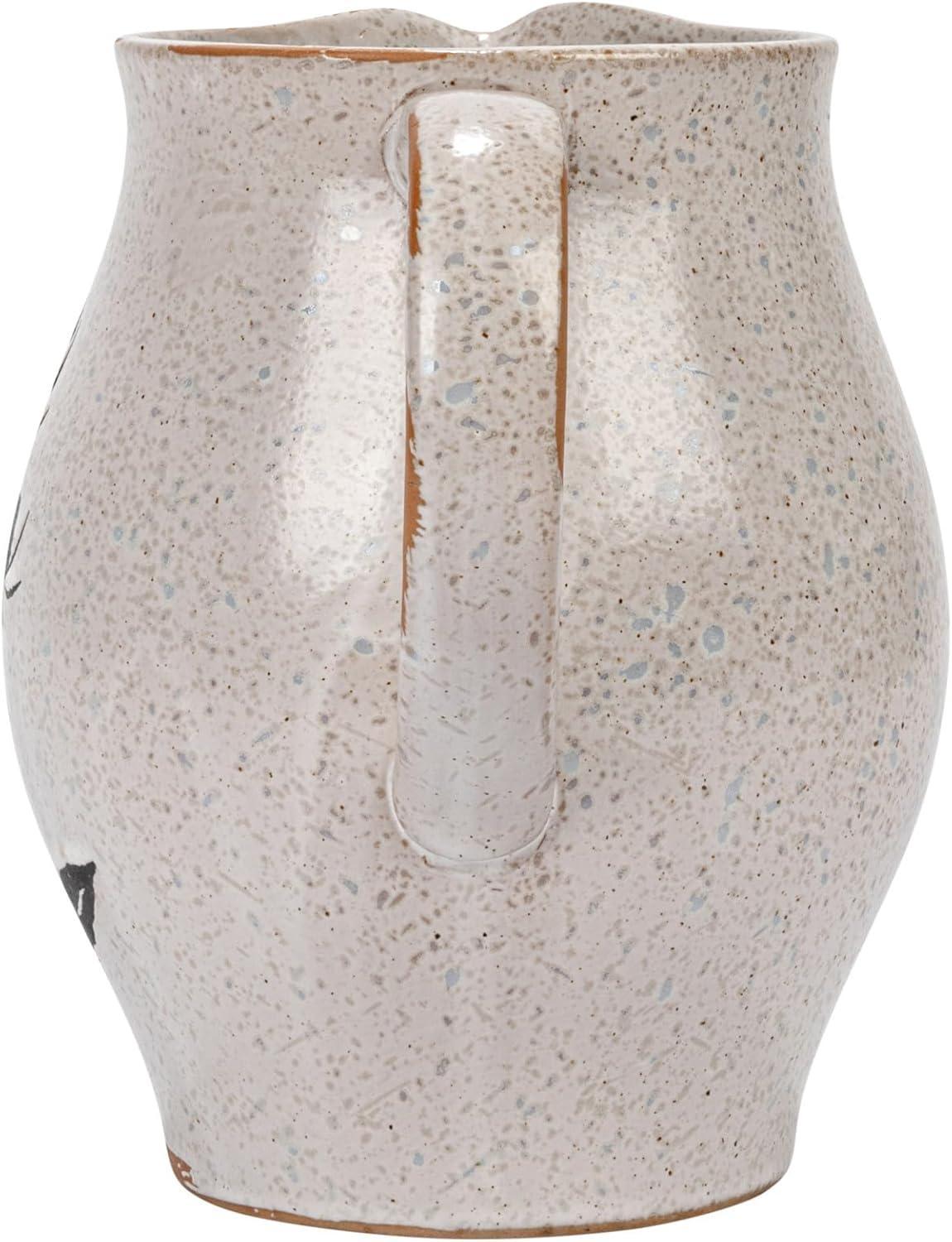 Creative Co-Op 6.75 Inches 50-ounce Debossed Stoneware Pitcher with Flower Design, Reactive Glaze, White and Black