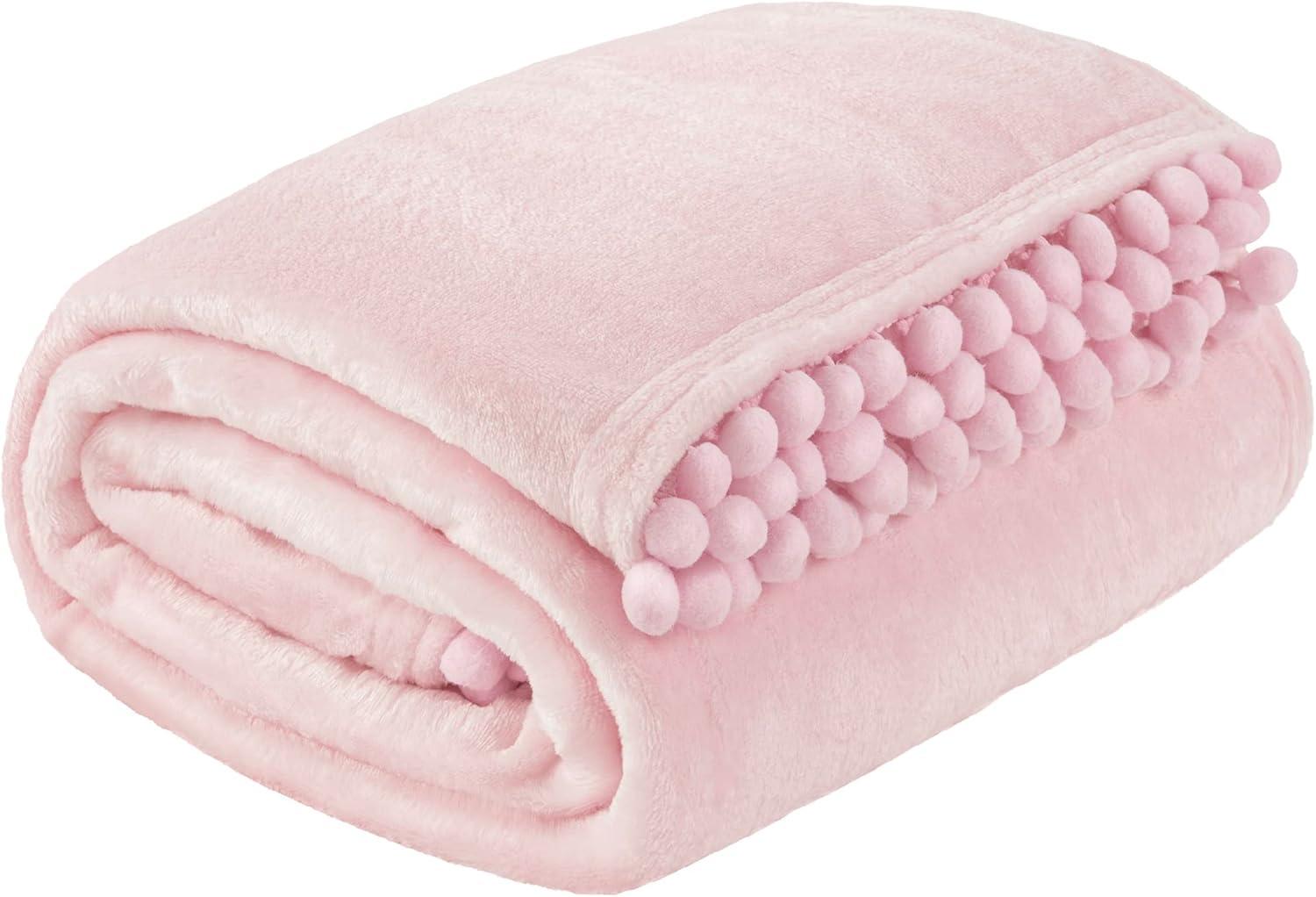 PAVILIA Fleece Throw Blanket for Couch with Pom Pom Fringe, Light Pink, Soft Cozy Fuzzy Flannel Blanket for Sofa Bed, Lightweight Plush All Season Throw, 50x60 Inches