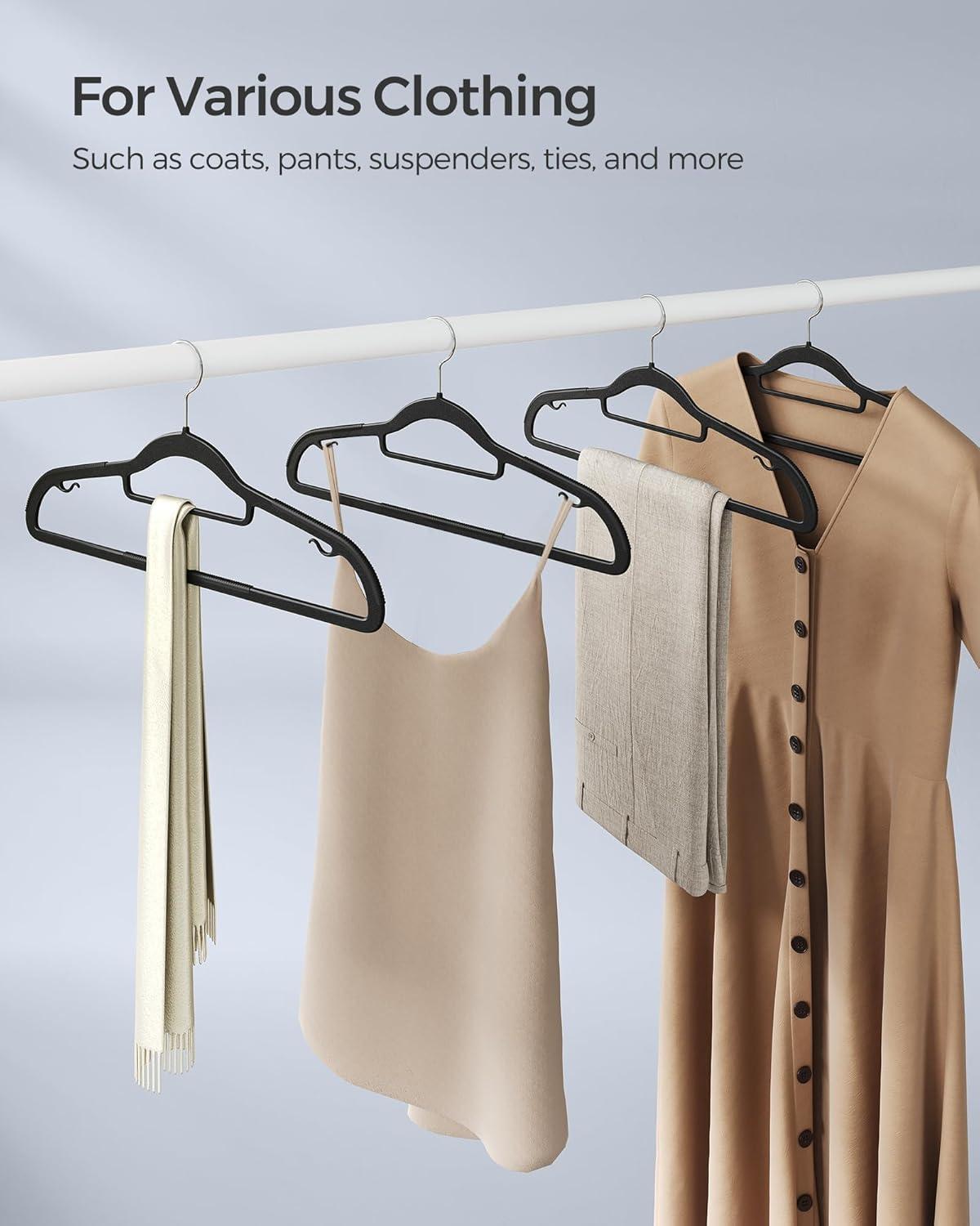 SONGMICS Pack of 30 Coat Hangers, Heavy-Duty Plastic Hangers, Non-Slip, Space-Saving Clothes Hangers, 0.2 Inches Slim, 16.5 Inches Wide, 360° Swivel Silver Hook, Black UCRP20BK30