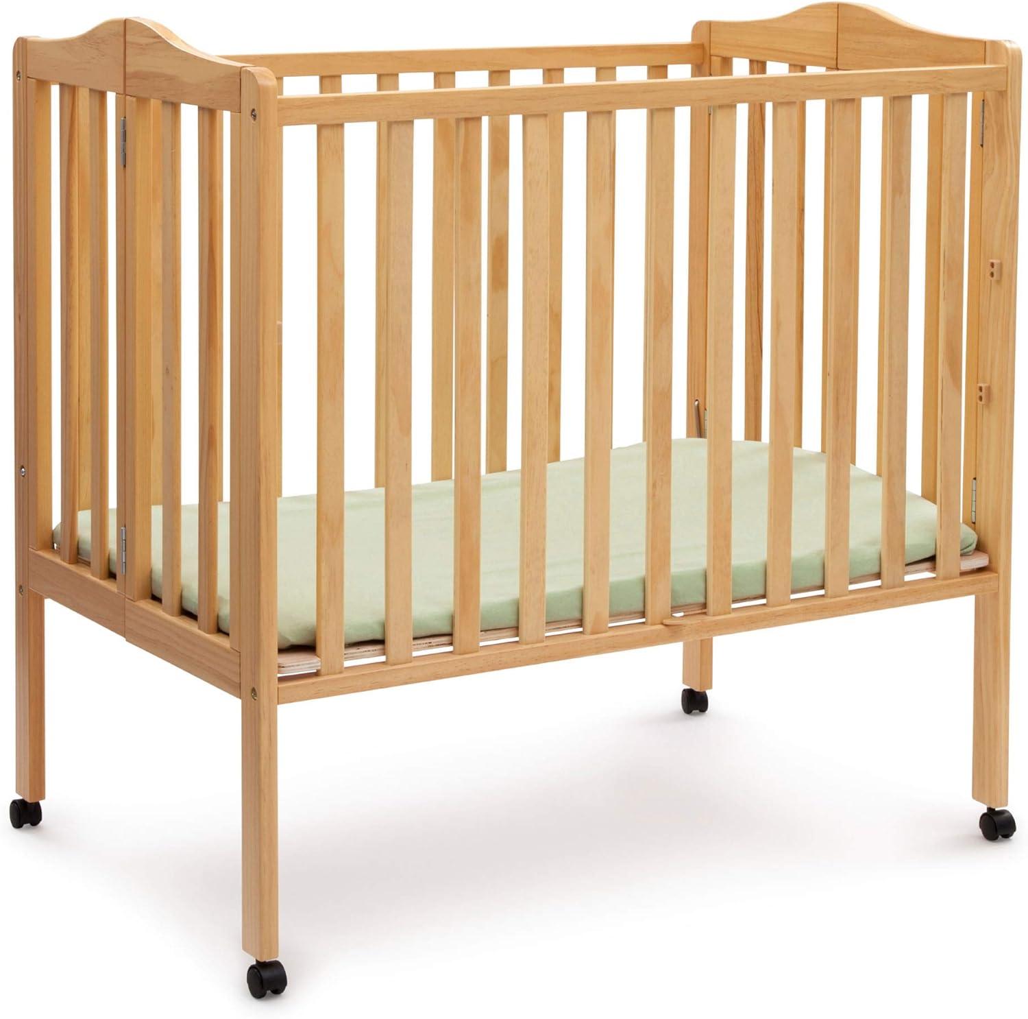 Delta Children Folding Mini Portable Crib with Mattress