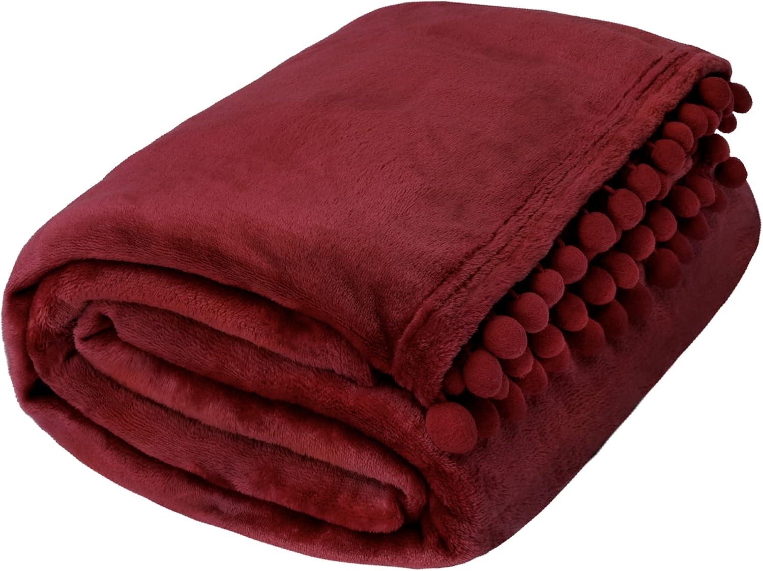 PAVILIA Fleece Throw Blanket for Couch with Pom Pom Fringe, Maroon Burgundy Red, Soft Cozy Fuzzy Flannel Blanket for Sofa Bed, Lightweight Plush All Season Throw, 50x60 Inches