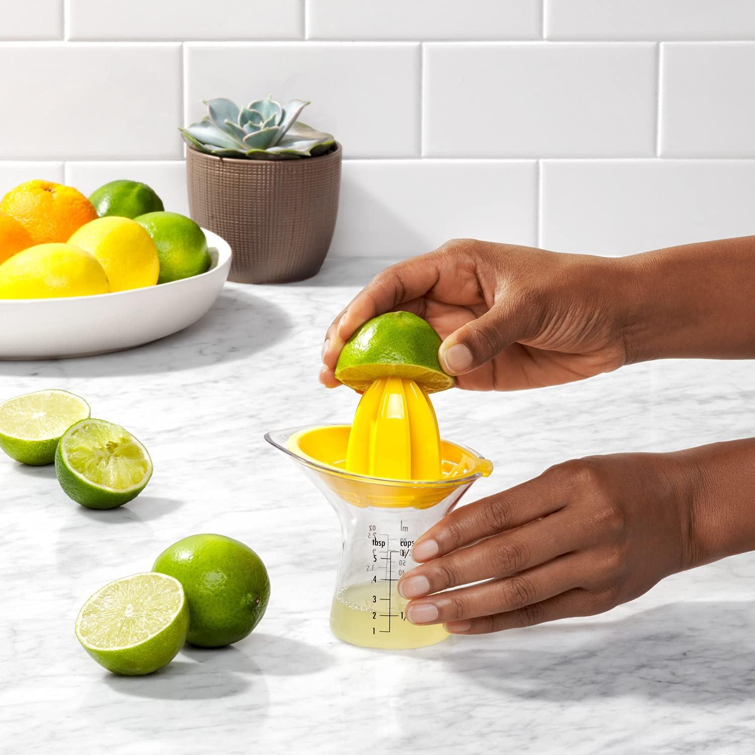 Yellow and Clear Plastic Citrus Juicer with Measurement Markings