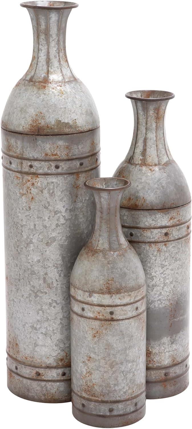 DecMode Farmhouse Cylinder Shape Extra Large Silver Distressed Metal Floor Vases, Set of 3, 43", 33", 25"H