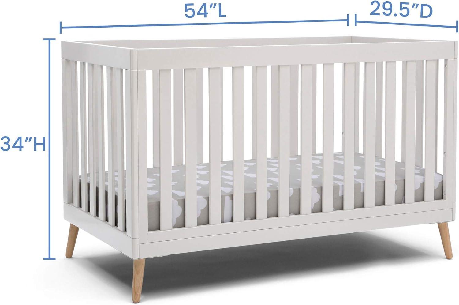 Delta Children Essex 4-in-1 Convertible Baby Crib, Bianca White/Natural Legs