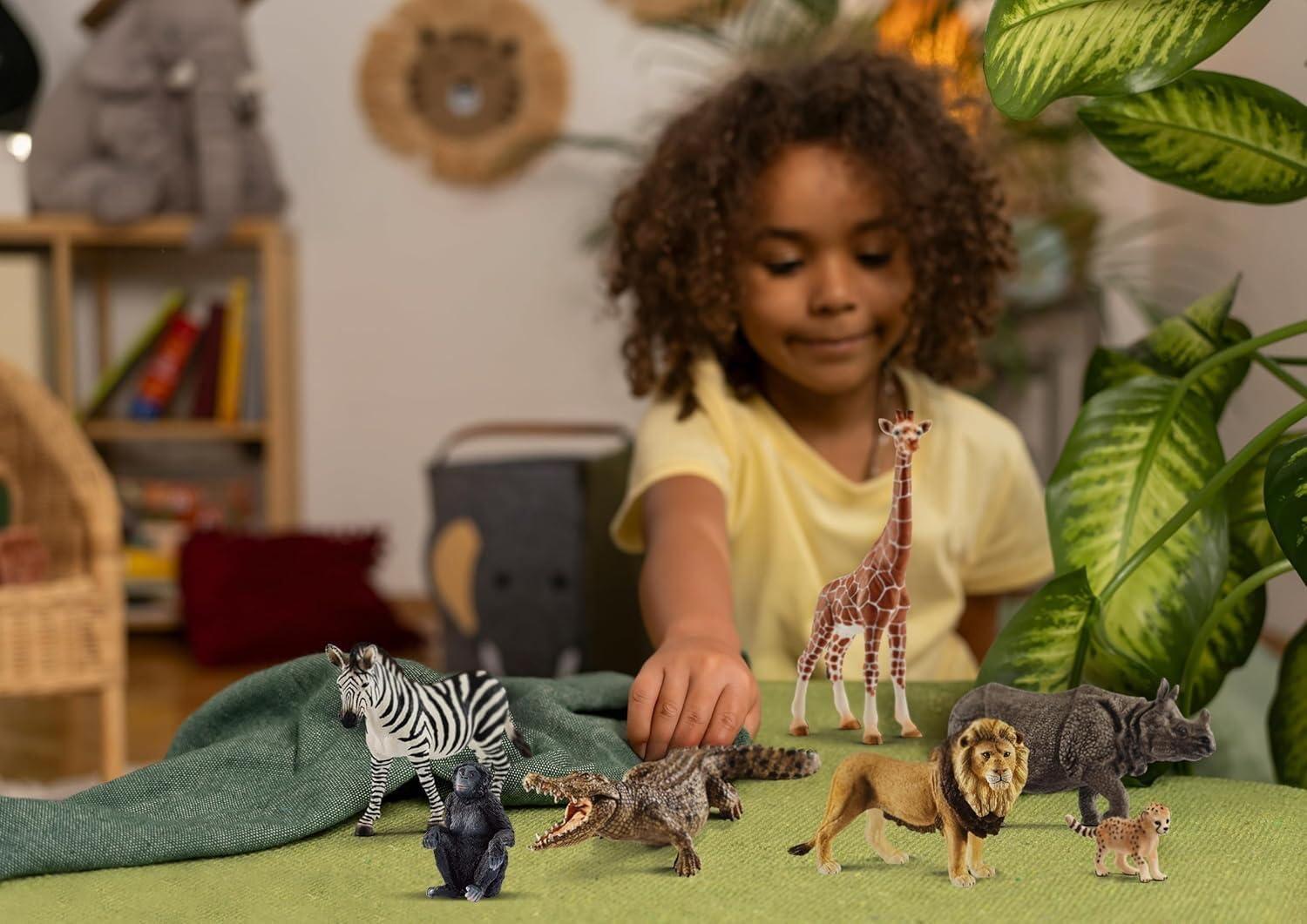 Schleich Animals Wild Life Safari Animals Figures 7-Piece Animal Figurines Set with Lion, Giraffe, Zebra, Bonobo, Rhino, Crocodile and Cheetah Cub Toy