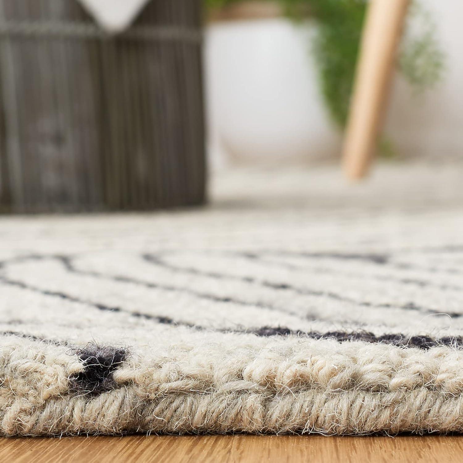 Metro MET451 Hand Tufted Indoor Accent Rug - Black/Ivory - 3'x5' - Safavieh
