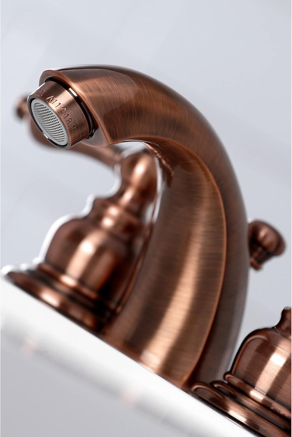 Kingston Brass Victorian Two-Handle 3-Hole Deck Mount Mini-Widespread Bathroom Faucet with Plastic Pop-Up