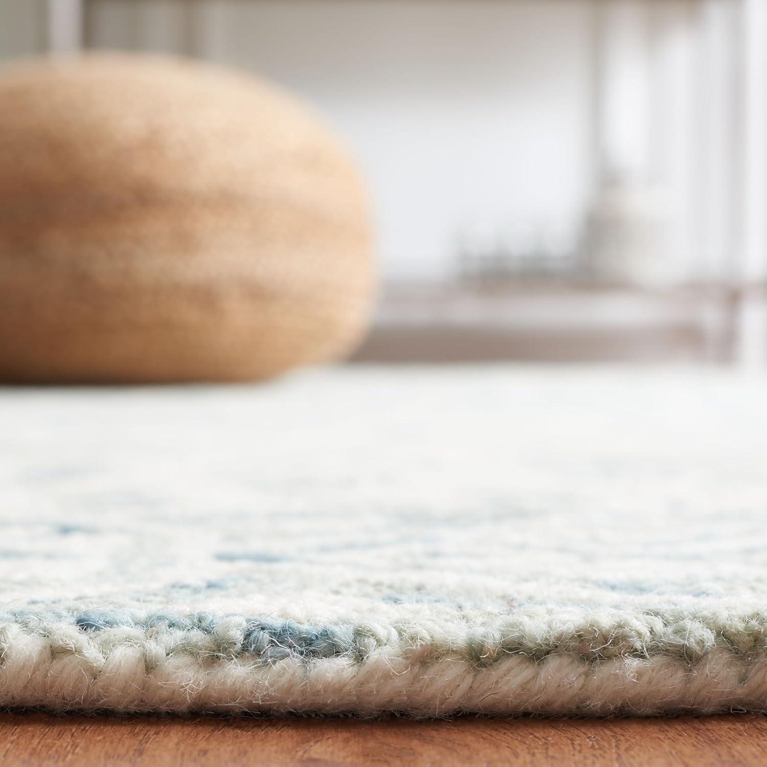 Handmade Light Blue and Ivory Tufted Wool Round Rug