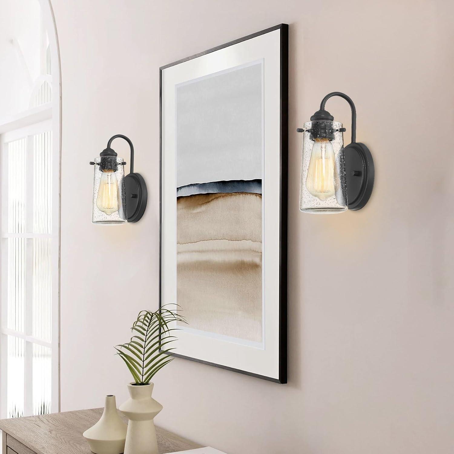 Kira Home Rayne 10" Modern Wall Sconce/Bathroom Light, Seeded Glass + Matte Black Finish