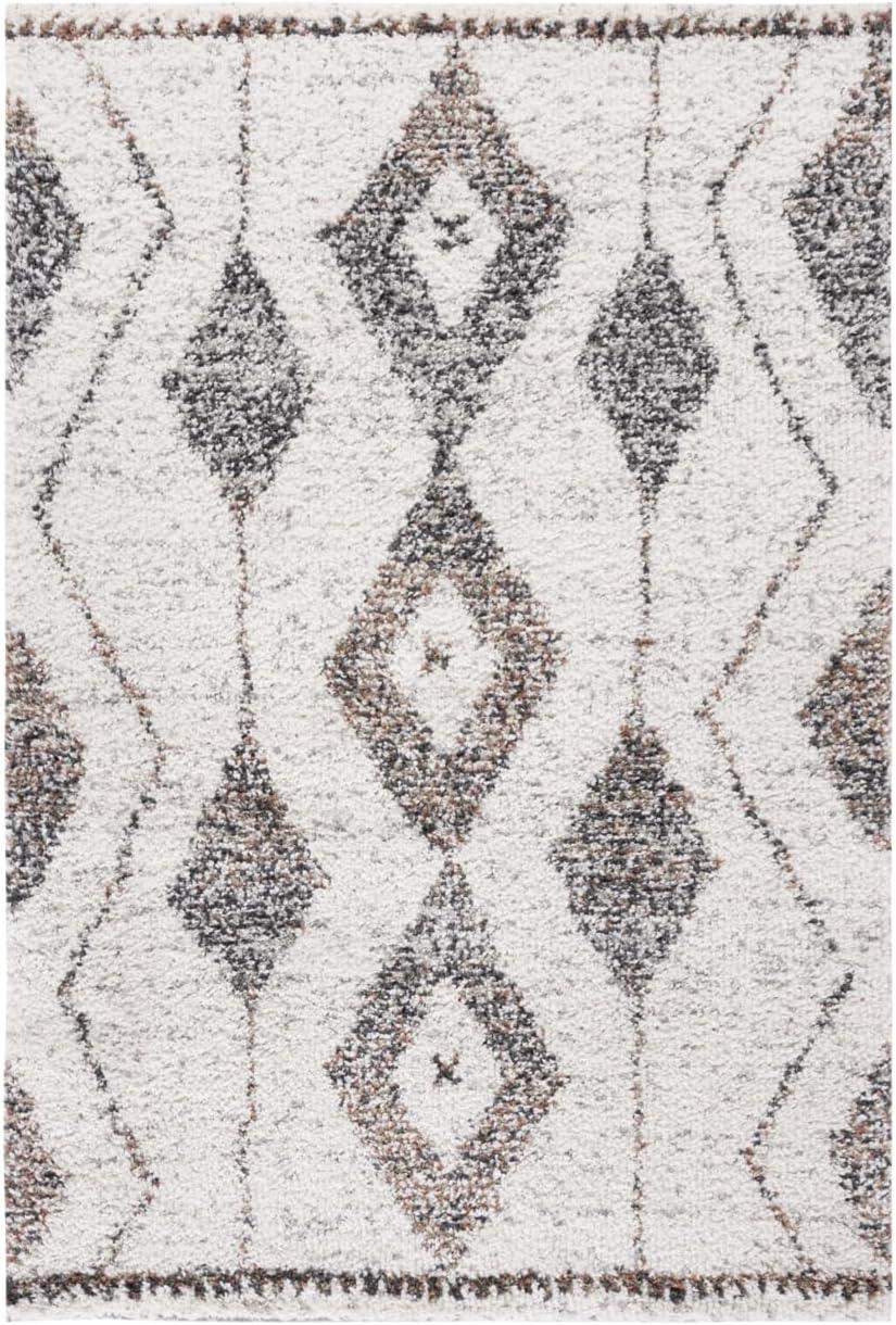 SAFAVIEH Jericho Newton Southwestern Polyester Shag Area Rug, Ivory/Black, 9' x 12'