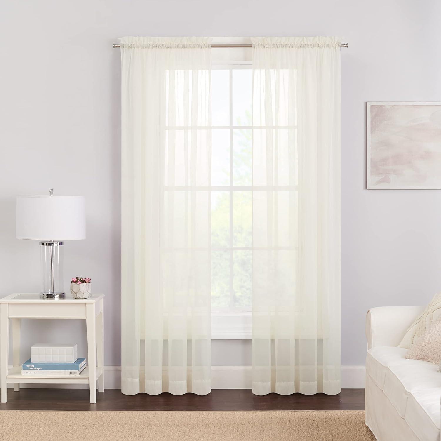 Victoria Ivory Solid Polyester 118 in. W x 63 in. L Sheer Pair Rod Pocket Curtain Panel