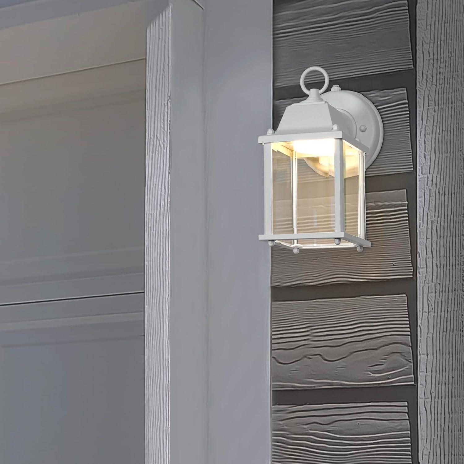 Maxxima LED Porch Lantern Outdoor Wall Light, White w/ Clear Glass, Dusk to Dawn Sensor, 650 Lumens, 3000K Warm White