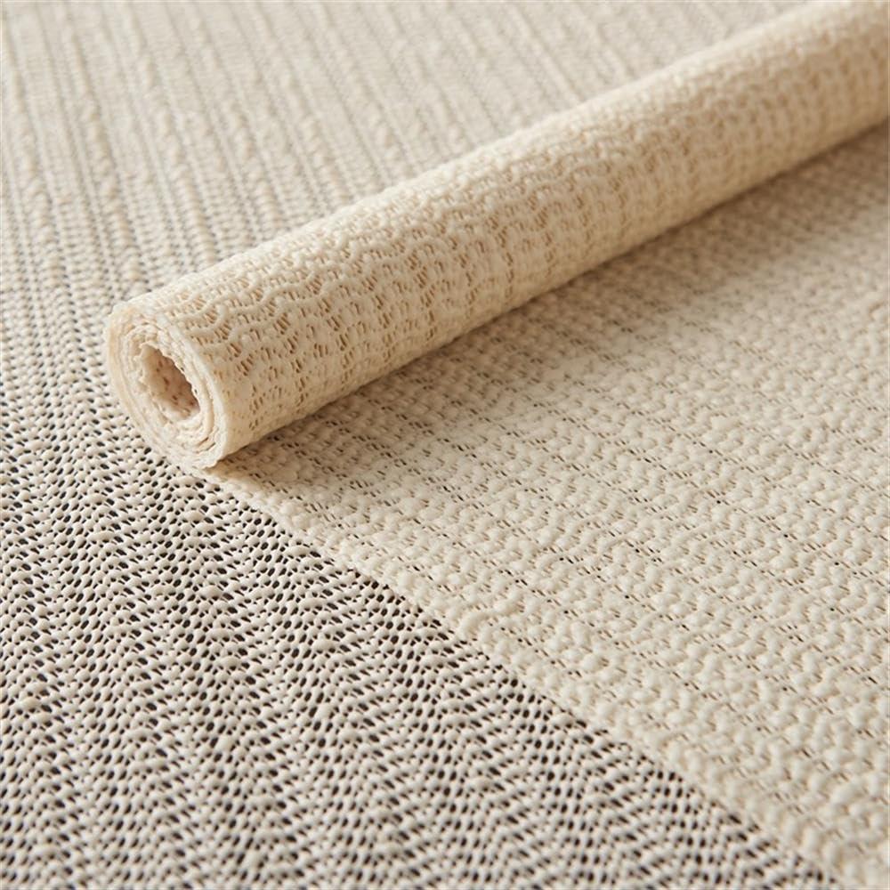 Ebern Designs Rectangle Shiftloc Solid Color Machine Made Polyester/Plastic/Acrylic Area Rug in Ivory